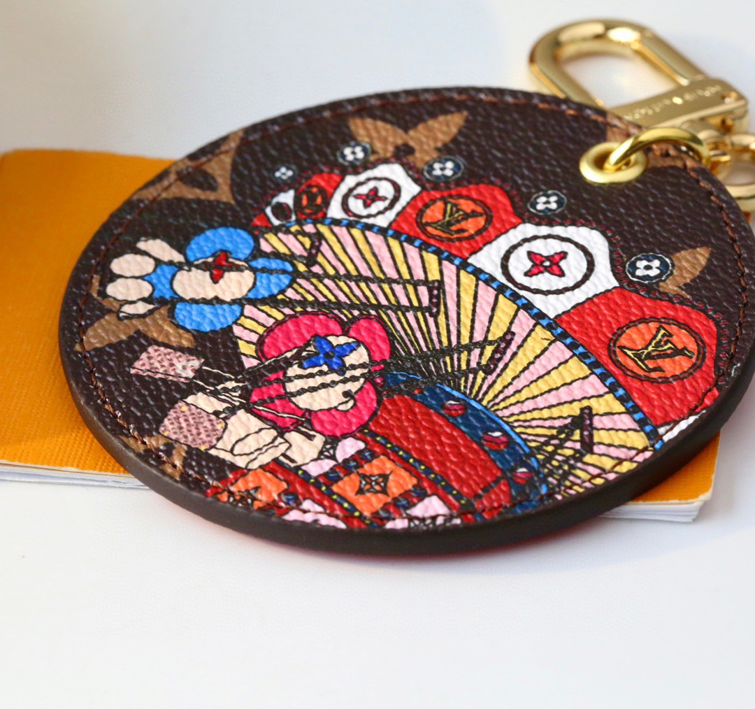 Louis Vuitton 루이비통 모노그램 회전목마 라운드 키홀더 참 7