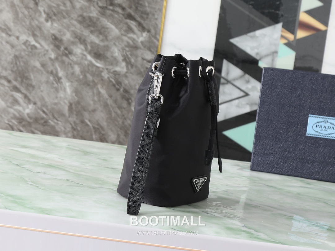 Prada Re-Nylon Drawstring Pouch Recycled Nylon, Calfskin Leather Black 프라다 리나일론 드로스트링 파우치 1NS369_R067_F0002 리사이클 나일론, 카프스킨 가죽 블랙 23cm 2