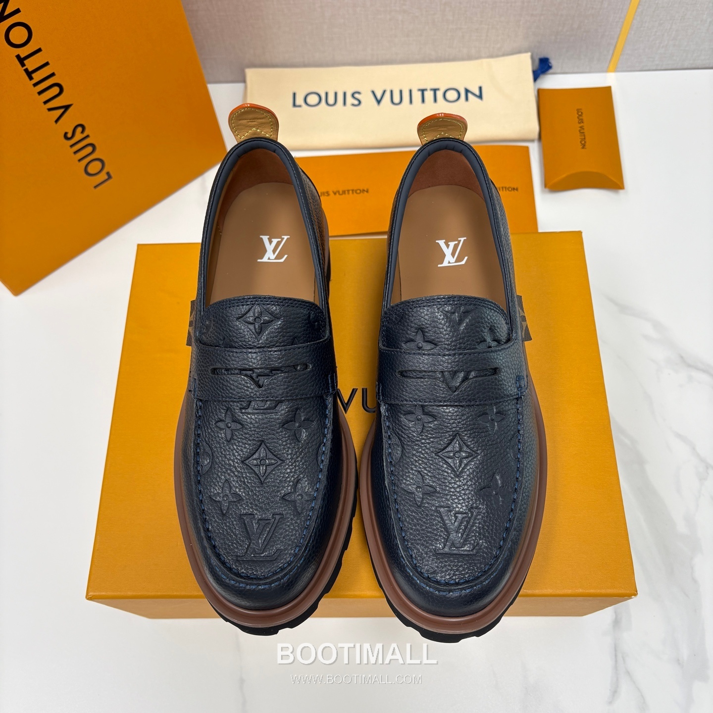 Louis Vuitton Monogram Embossed Calfskin Leather Platform Loafer Shoes with Chunky Rubber Sole Detail 루이비통 모노그램 엠보싱 카프스킨 레더 플랫폼 로퍼 슈즈 4.5cm 1