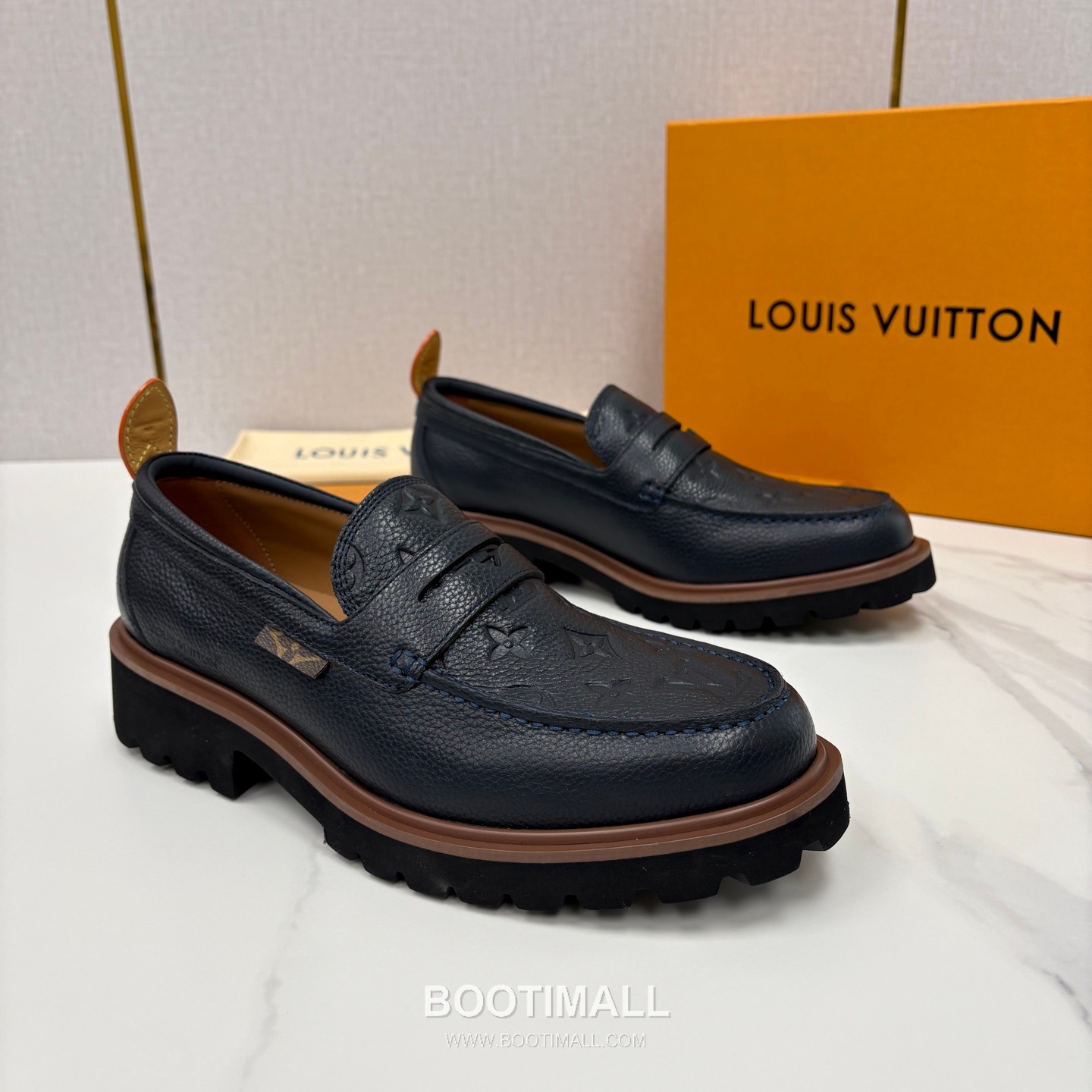 Louis Vuitton Monogram Embossed Calfskin Leather Platform Loafer Shoes with Chunky Rubber Sole Detail 루이비통 모노그램 엠보싱 카프스킨 레더 플랫폼 로퍼 슈즈 4.5cm 3