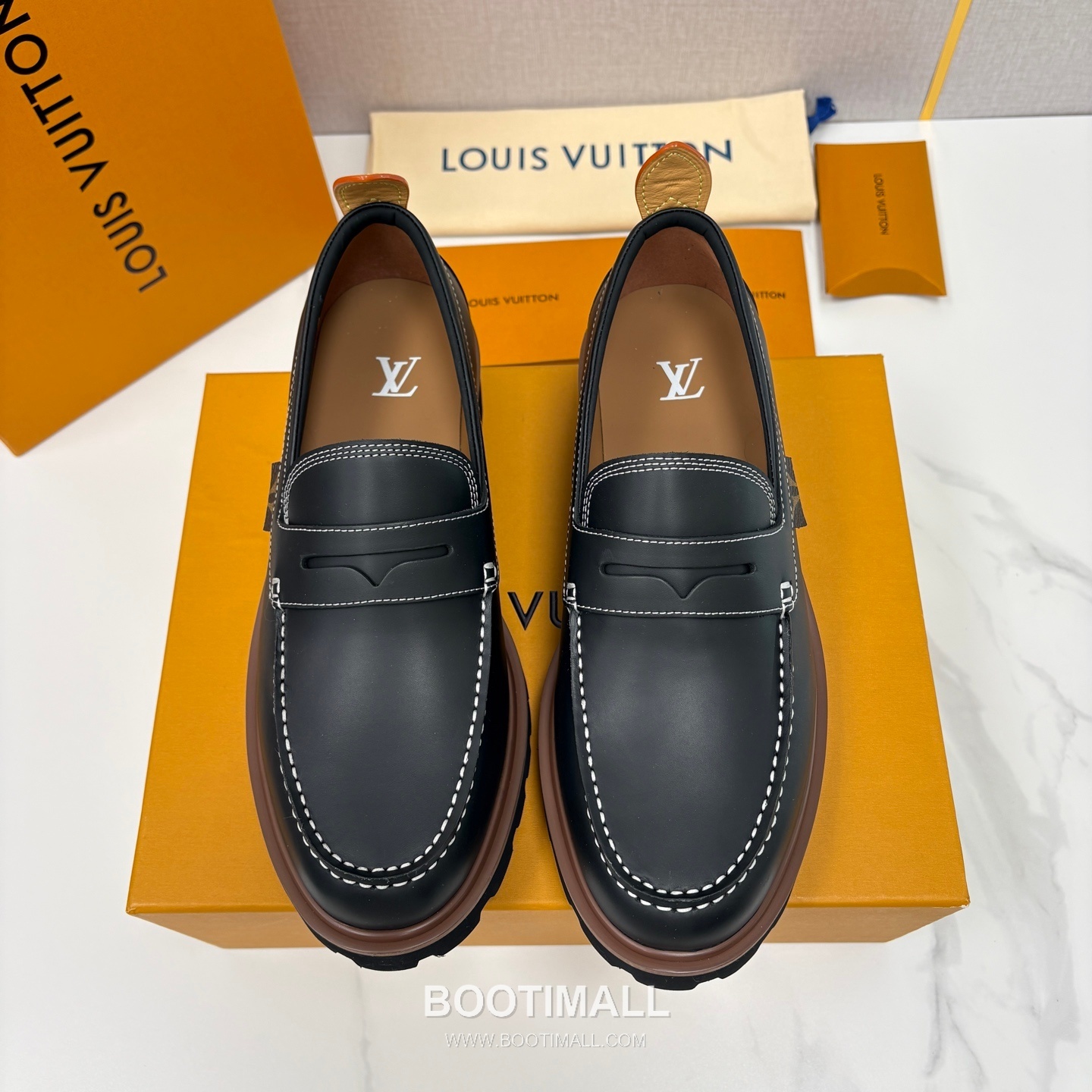 Louis Vuitton Monogram Embossed Calfskin Leather Platform Loafer Shoes with Chunky Rubber Sole Detail 루이비통 모노그램 엠보싱 카프스킨 레더 플랫폼 로퍼 슈즈 4.5cm 1