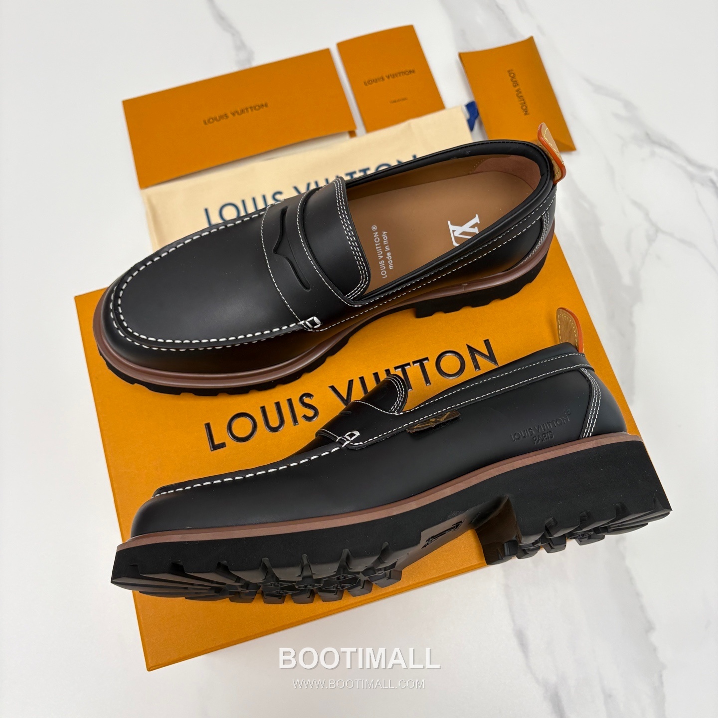 Louis Vuitton Monogram Embossed Calfskin Leather Platform Loafer Shoes with Chunky Rubber Sole Detail 루이비통 모노그램 엠보싱 카프스킨 레더 플랫폼 로퍼 슈즈 4.5cm 2