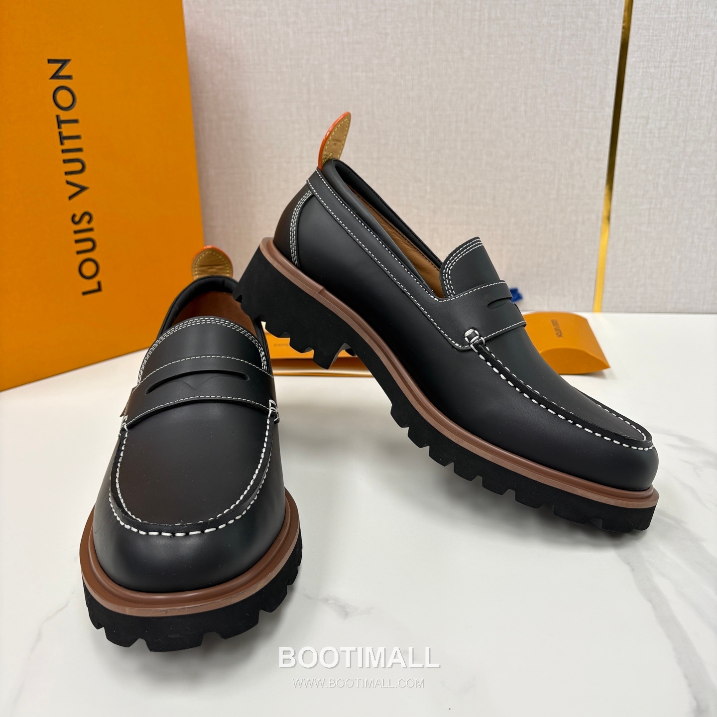 Louis Vuitton Monogram Embossed Calfskin Leather Platform Loafer Shoes with Chunky Rubber Sole Detail 루이비통 모노그램 엠보싱 카프스킨 레더 플랫폼 로퍼 슈즈 4.5cm 4