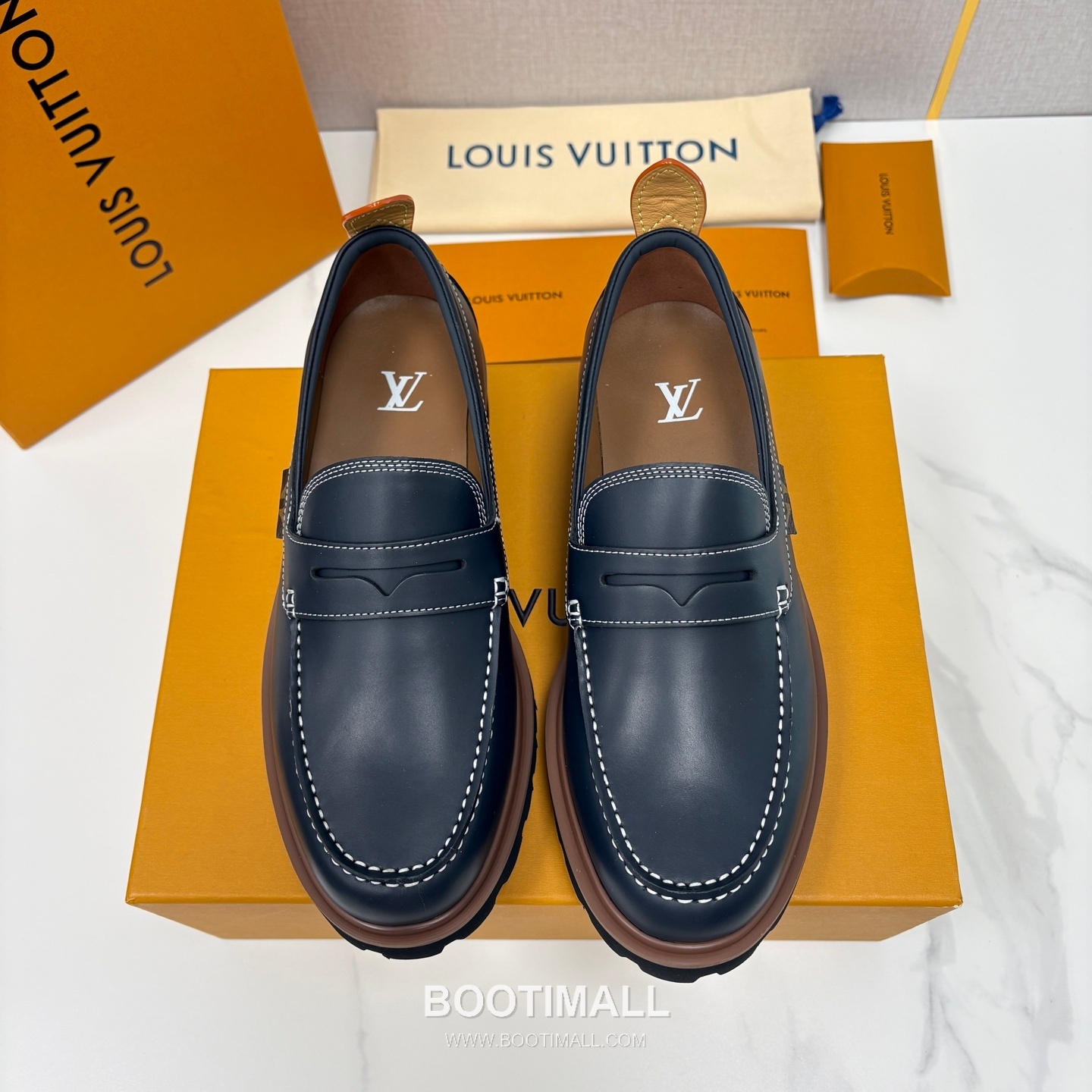 Louis Vuitton Monogram Embossed Calfskin Leather Platform Loafer Shoes with Chunky Rubber Sole Detail 루이비통 모노그램 엠보싱 카프스킨 레더 플랫폼 로퍼 슈즈 4.5cm 1