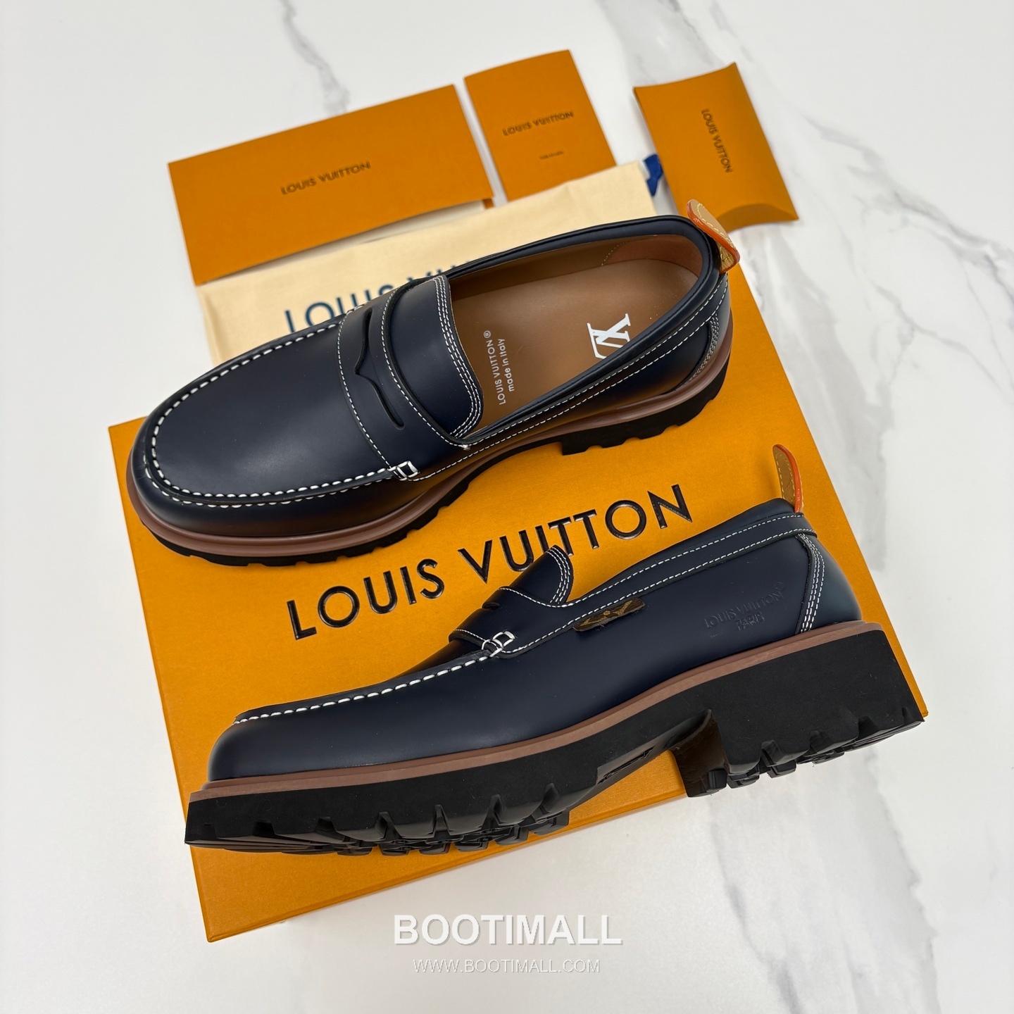 Louis Vuitton Monogram Embossed Calfskin Leather Platform Loafer Shoes with Chunky Rubber Sole Detail 루이비통 모노그램 엠보싱 카프스킨 레더 플랫폼 로퍼 슈즈 4.5cm 2