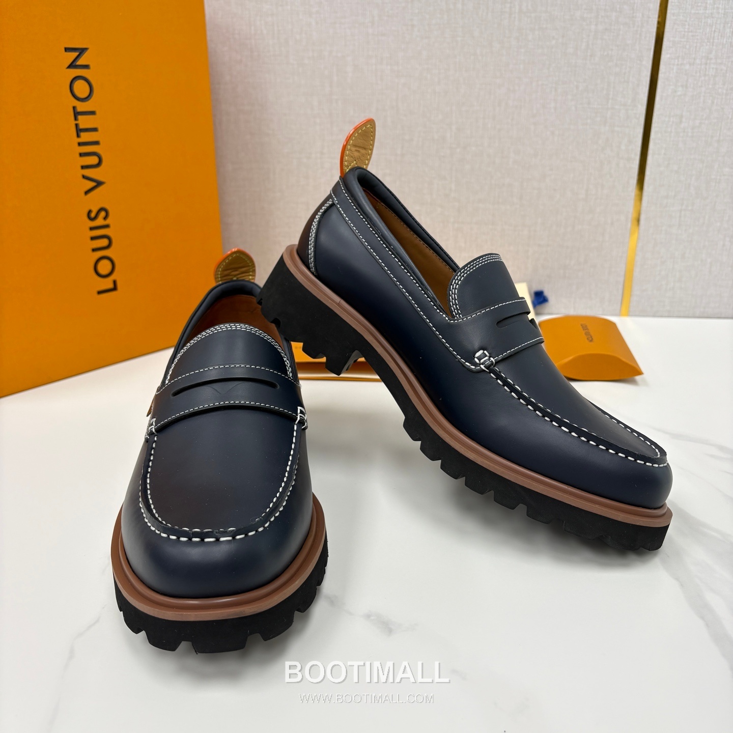 Louis Vuitton Monogram Embossed Calfskin Leather Platform Loafer Shoes with Chunky Rubber Sole Detail 루이비통 모노그램 엠보싱 카프스킨 레더 플랫폼 로퍼 슈즈 4.5cm 4