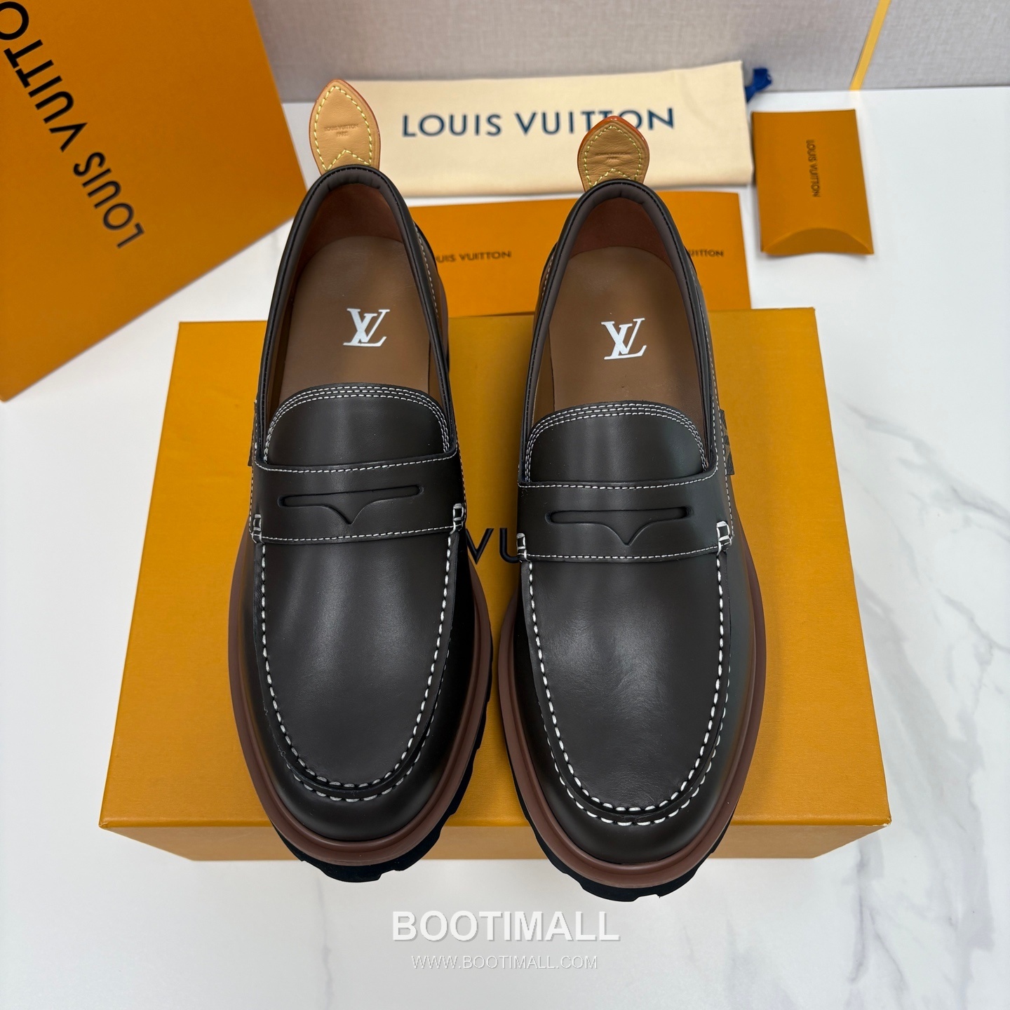 Louis Vuitton Monogram Embossed Calfskin Leather Platform Loafer Shoes with Chunky Rubber Sole Detail 루이비통 모노그램 엠보싱 카프스킨 레더 플랫폼 로퍼 슈즈 4.5cm 1