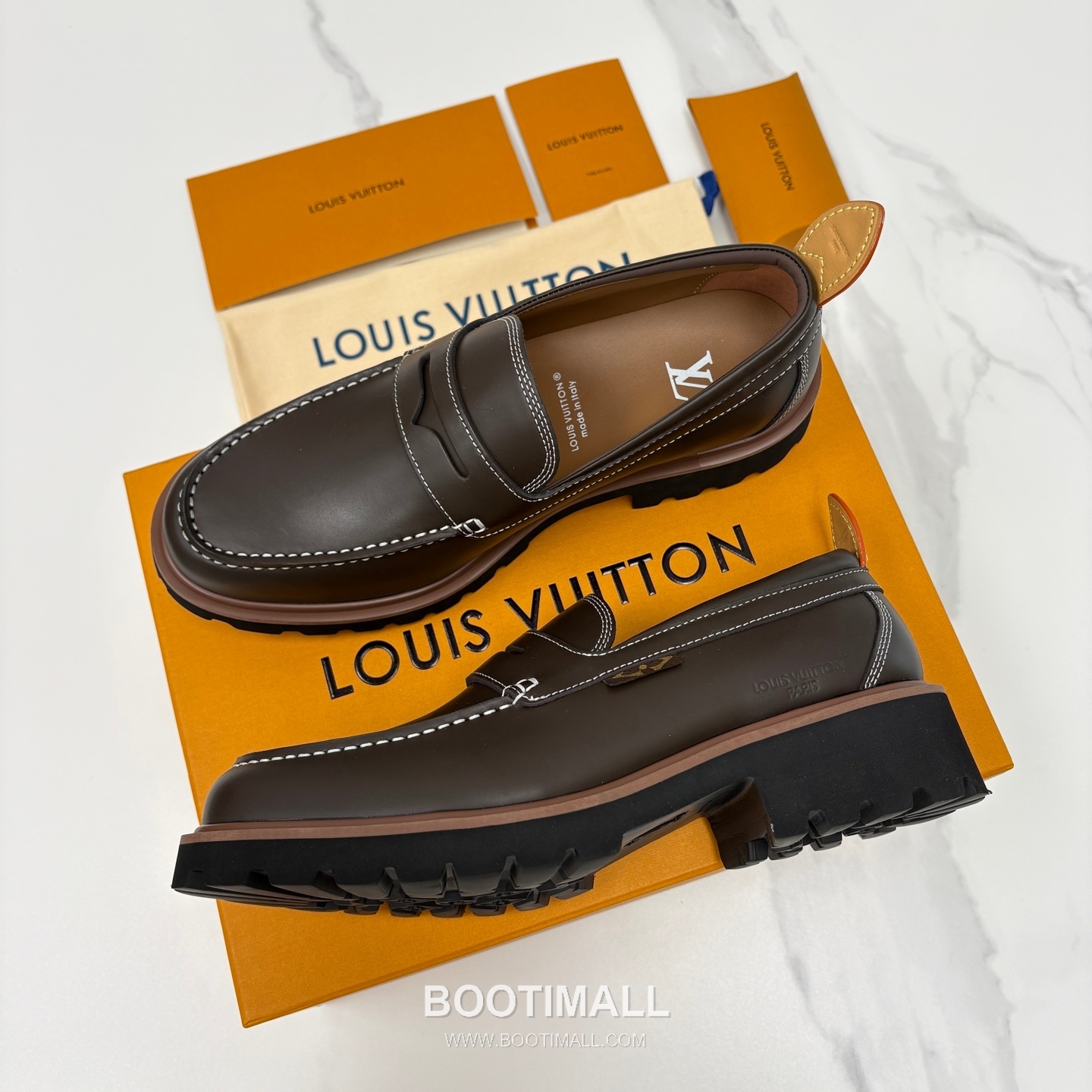 Louis Vuitton Monogram Embossed Calfskin Leather Platform Loafer Shoes with Chunky Rubber Sole Detail 루이비통 모노그램 엠보싱 카프스킨 레더 플랫폼 로퍼 슈즈 4.5cm 2