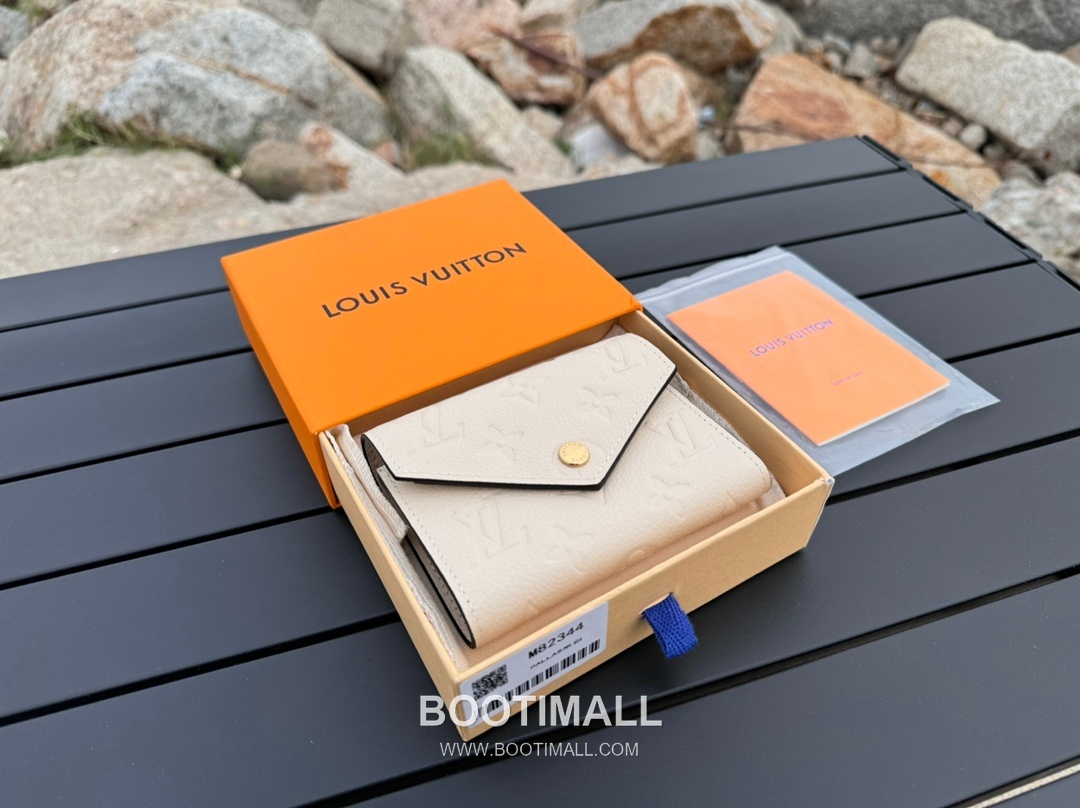 Louis Vuitton Victorine Monogram Empreinte Leather Wallet with Snap Flap Detail 루이비통 빅토린 모노그램 앙프렝뜨 반지갑 스냅플랩 M82334 12cm 1