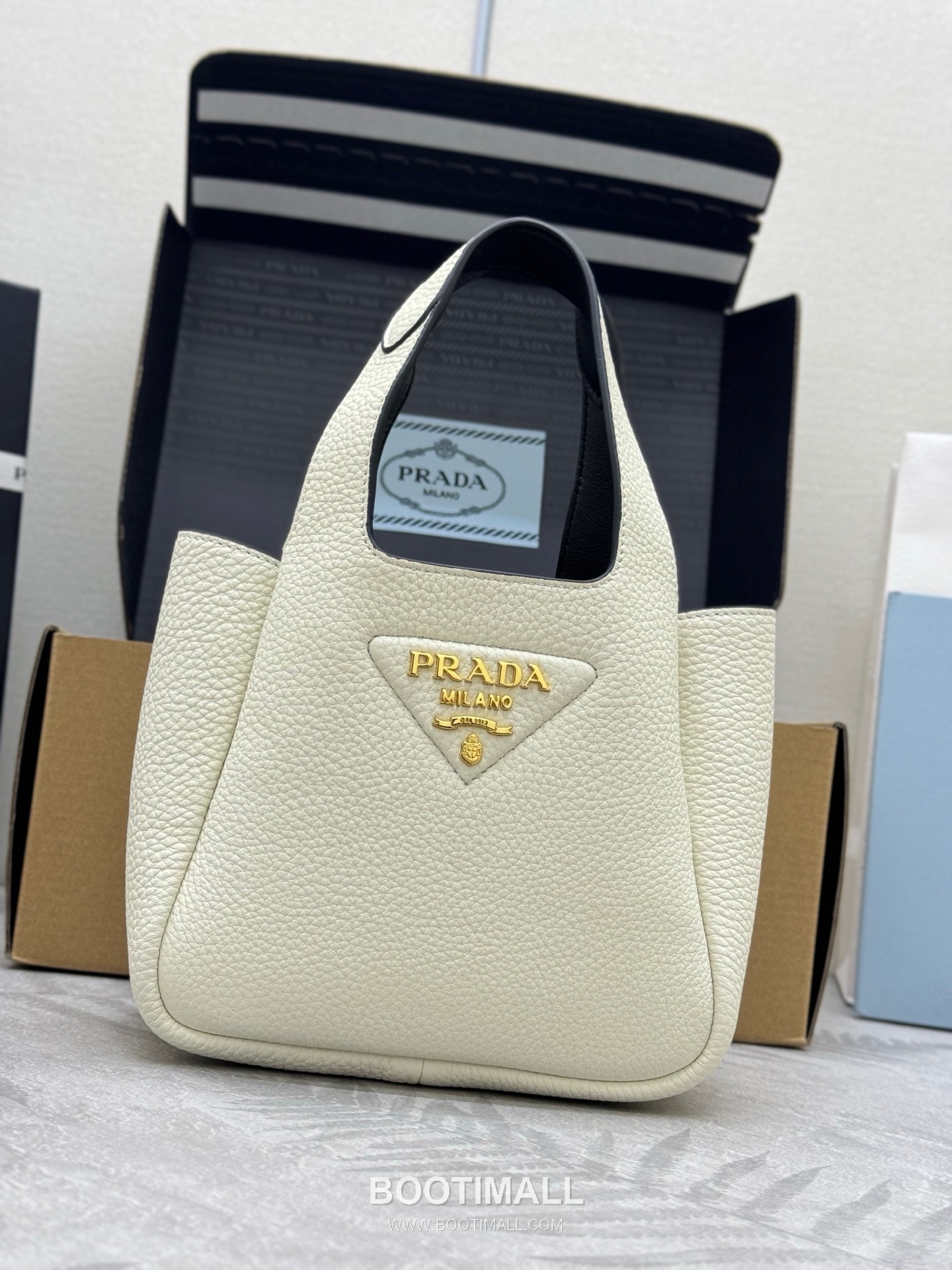 Prada Mini Deer Grain Calfskin Bucket Bag with Gold Hardware Detail 프라다 미니 디어그레인 카프스킨 버킷백 금속디테일 1BA349 18cm 1