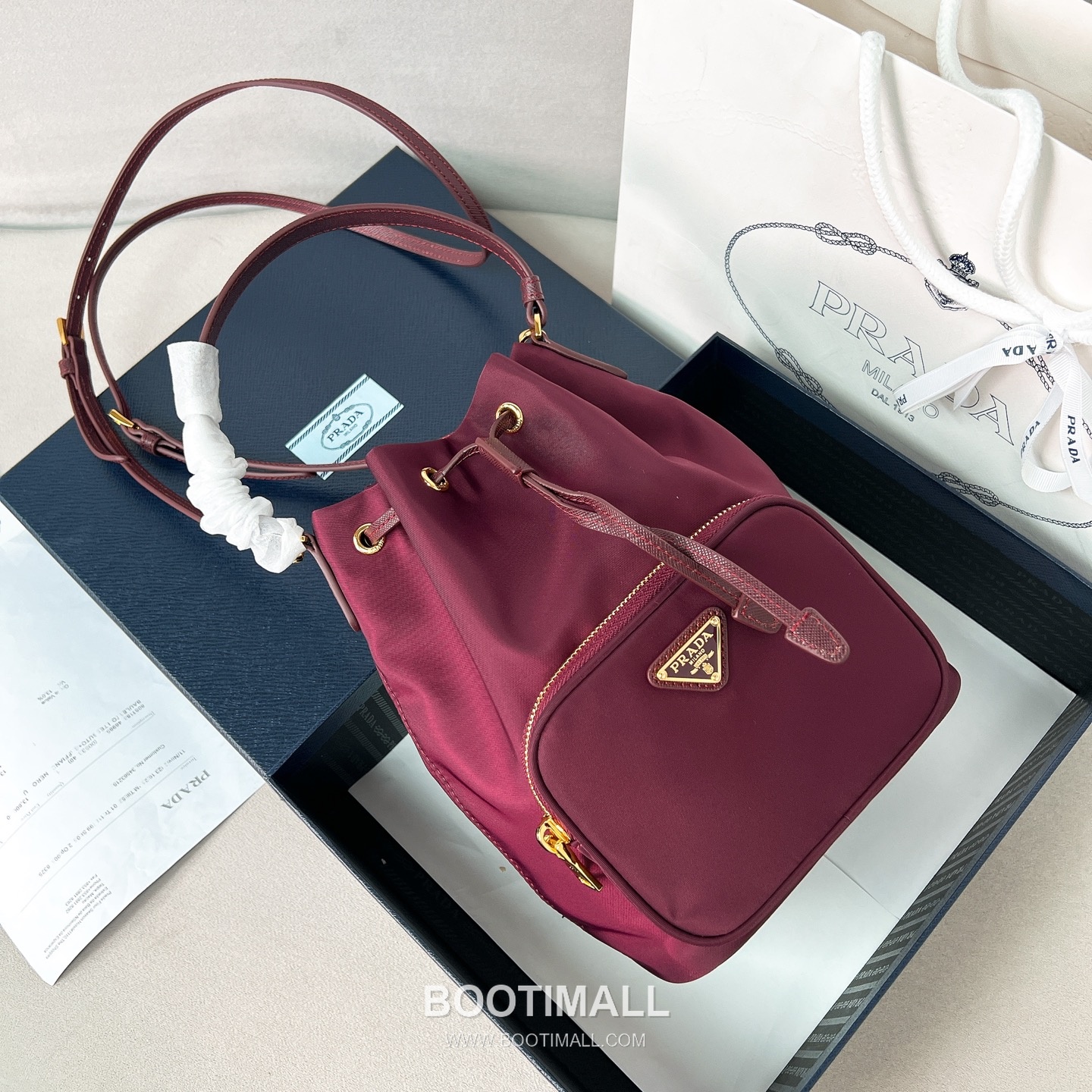 Prada Parachute Nylon Bucket Bag with Triangle Logo Drawstring Detail 프라다 패러슈트 나일론 트라이앵글 로고 드로우스트링 버킷백 1BH038 18cm 7