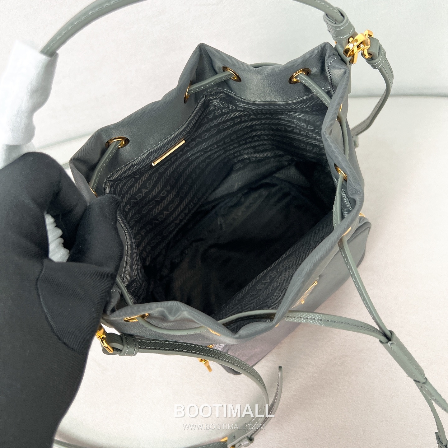 Prada Parachute Nylon Bucket Bag with Triangle Logo Drawstring Detail 프라다 패러슈트 나일론 트라이앵글 로고 드로우스트링 버킷백 1BH038 18cm 8