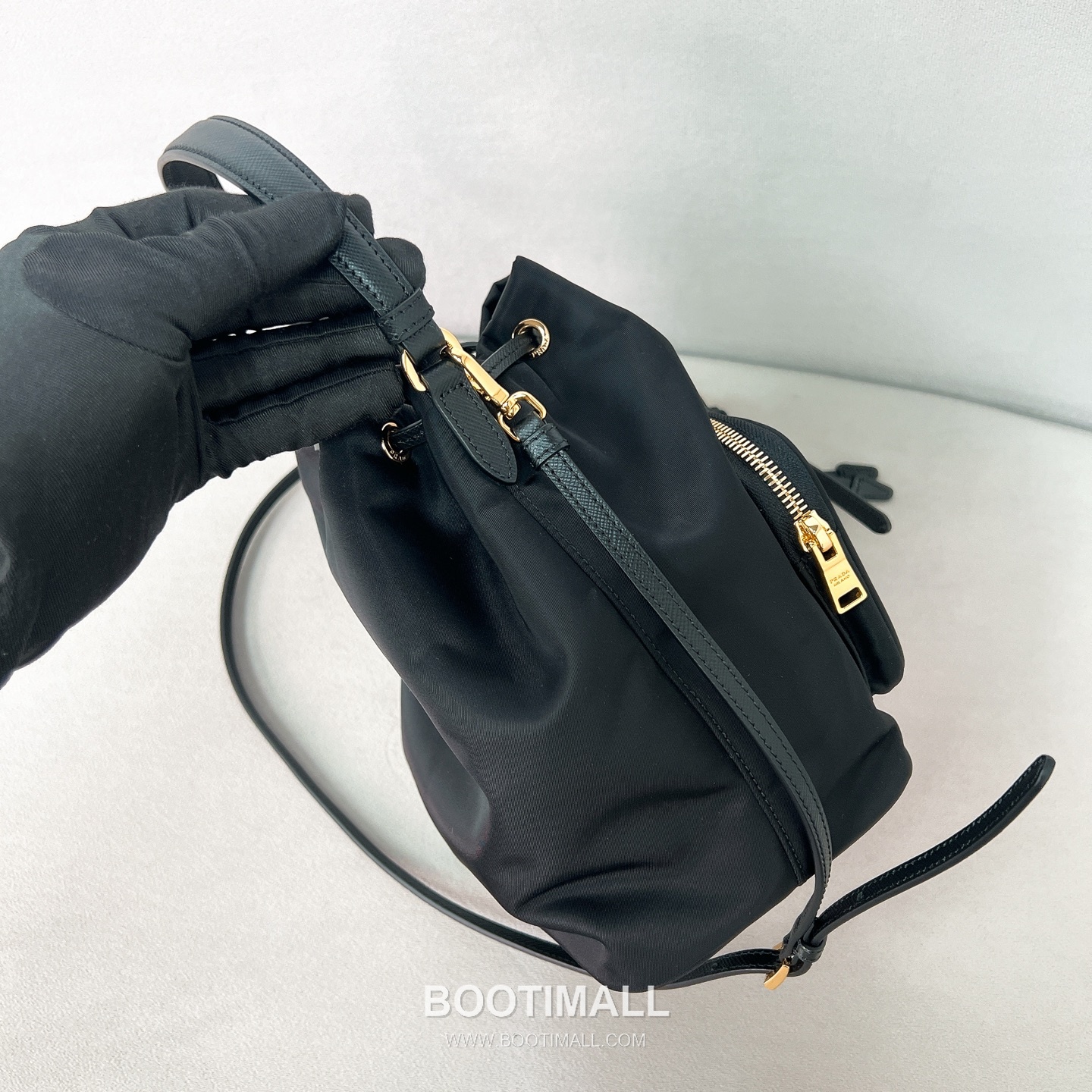 Prada Parachute Nylon Bucket Bag with Triangle Logo Drawstring Detail 프라다 패러슈트 나일론 트라이앵글 로고 드로우스트링 버킷백 1BH038 18cm 7