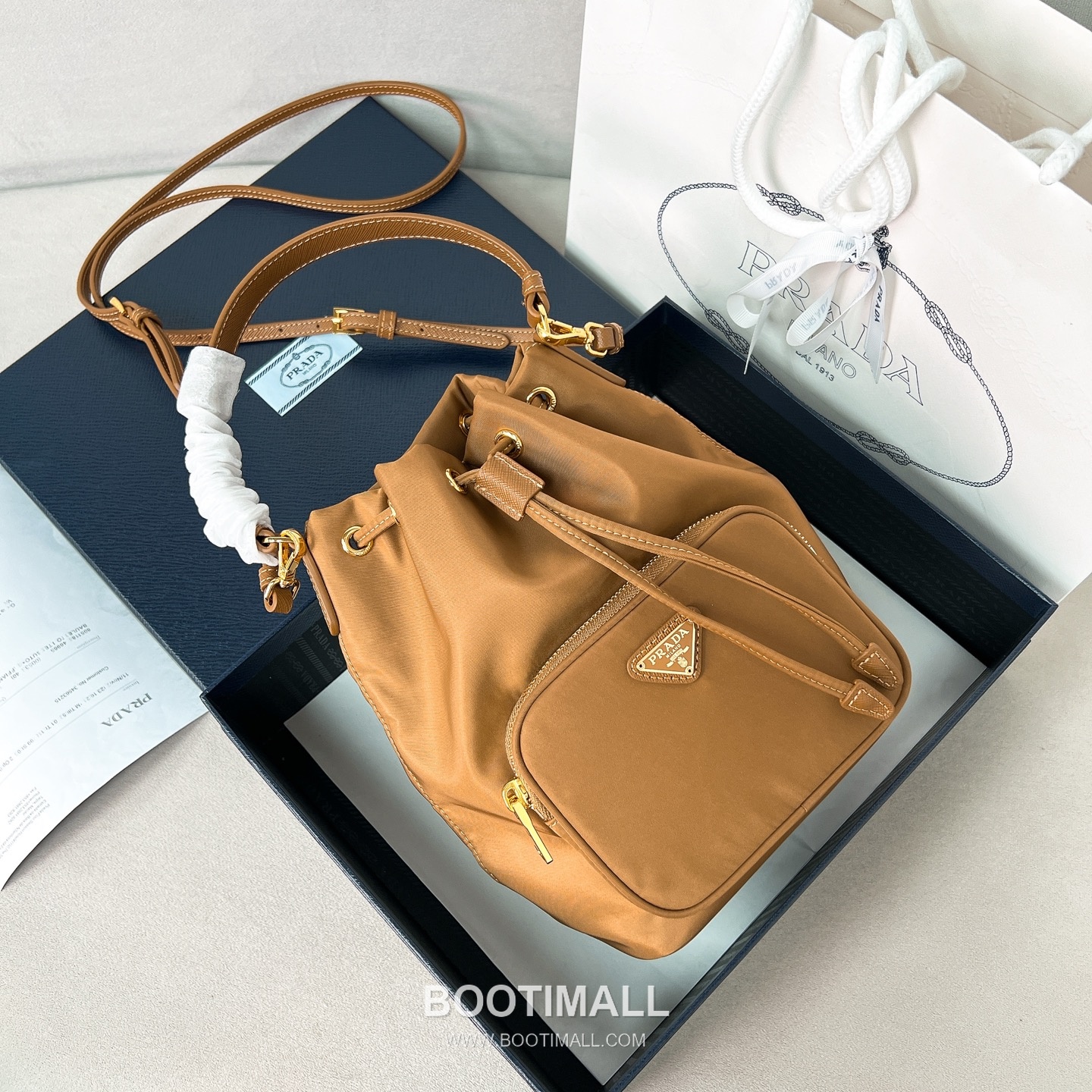 Prada Parachute Nylon Bucket Bag with Triangle Logo Drawstring Detail 프라다 패러슈트 나일론 트라이앵글 로고 드로우스트링 버킷백 1BH038 18cm 1