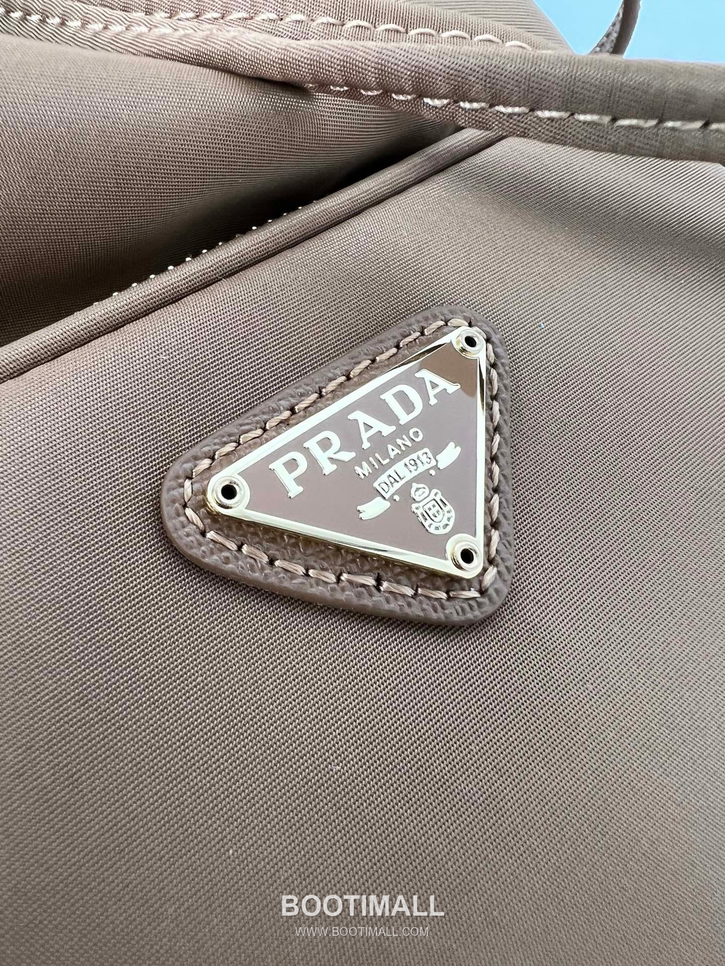 Prada Parachute Nylon Bucket Bag with Triangle Logo Drawstring Detail 프라다 패러슈트 나일론 트라이앵글 로고 드로우스트링 버킷백 1BH038 18cm 6