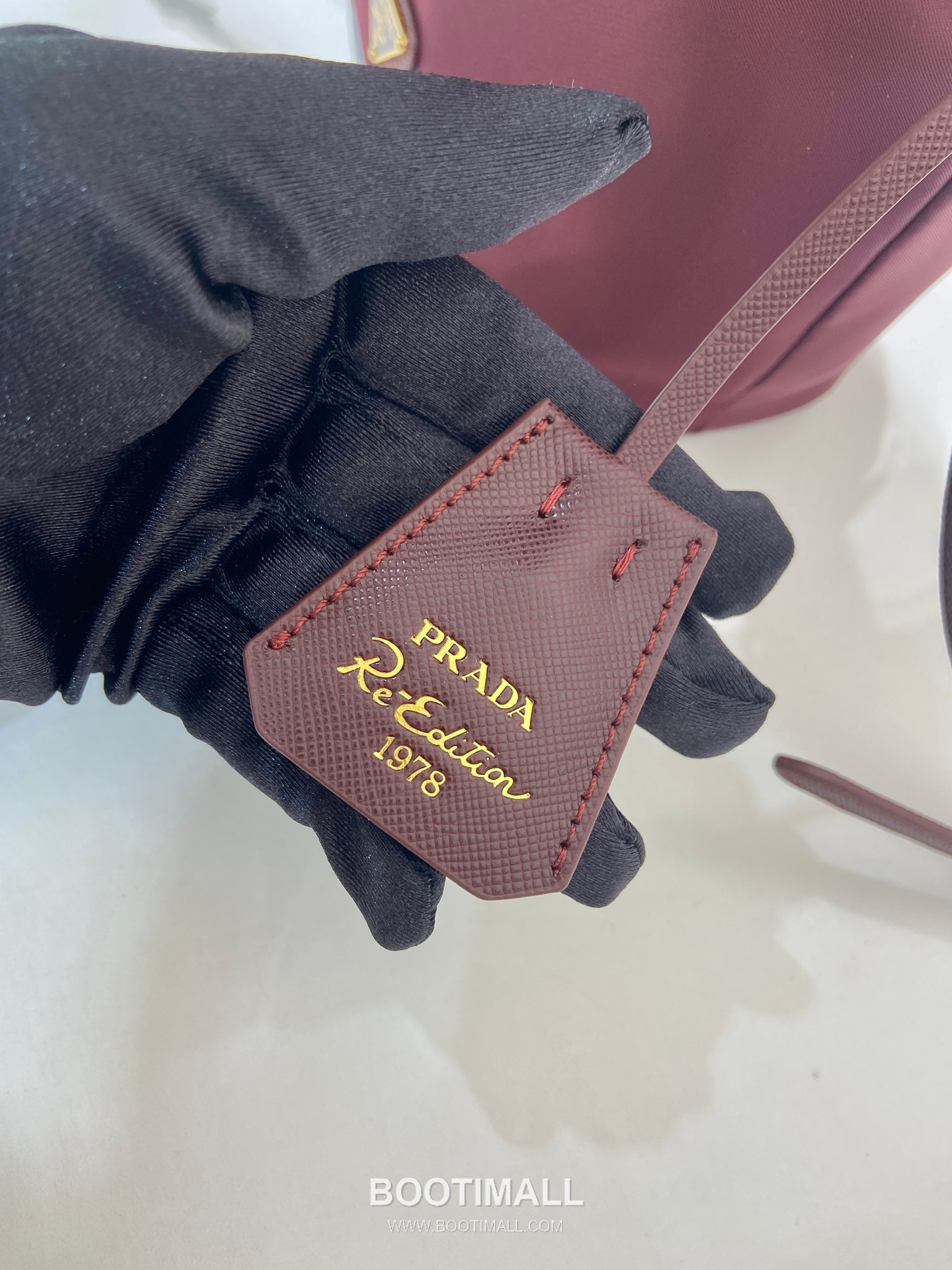 Prada Nylon Bucket Bag with Calfskin Strap Triangle Logo Key Charm Detail 프라다 나일론 카프스킨 스트랩 트라이앵글 로고 키참 버킷백 1BE067 15.5cm 9