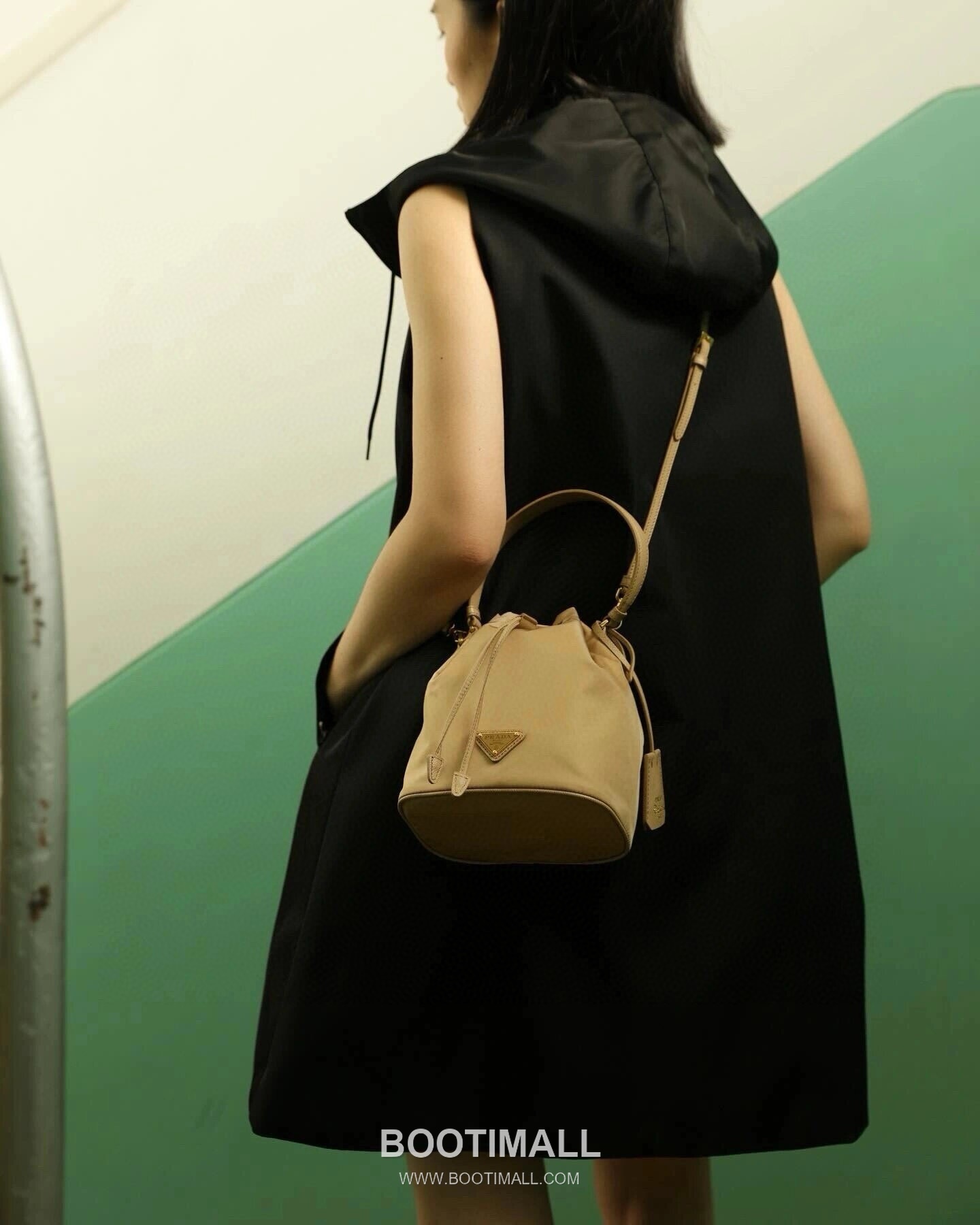 Prada Nylon Bucket Bag with Calfskin Strap Triangle Logo Key Charm Detail 프라다 나일론 카프스킨 스트랩 트라이앵글 로고 키참 버킷백 1BE067 15.5cm 1