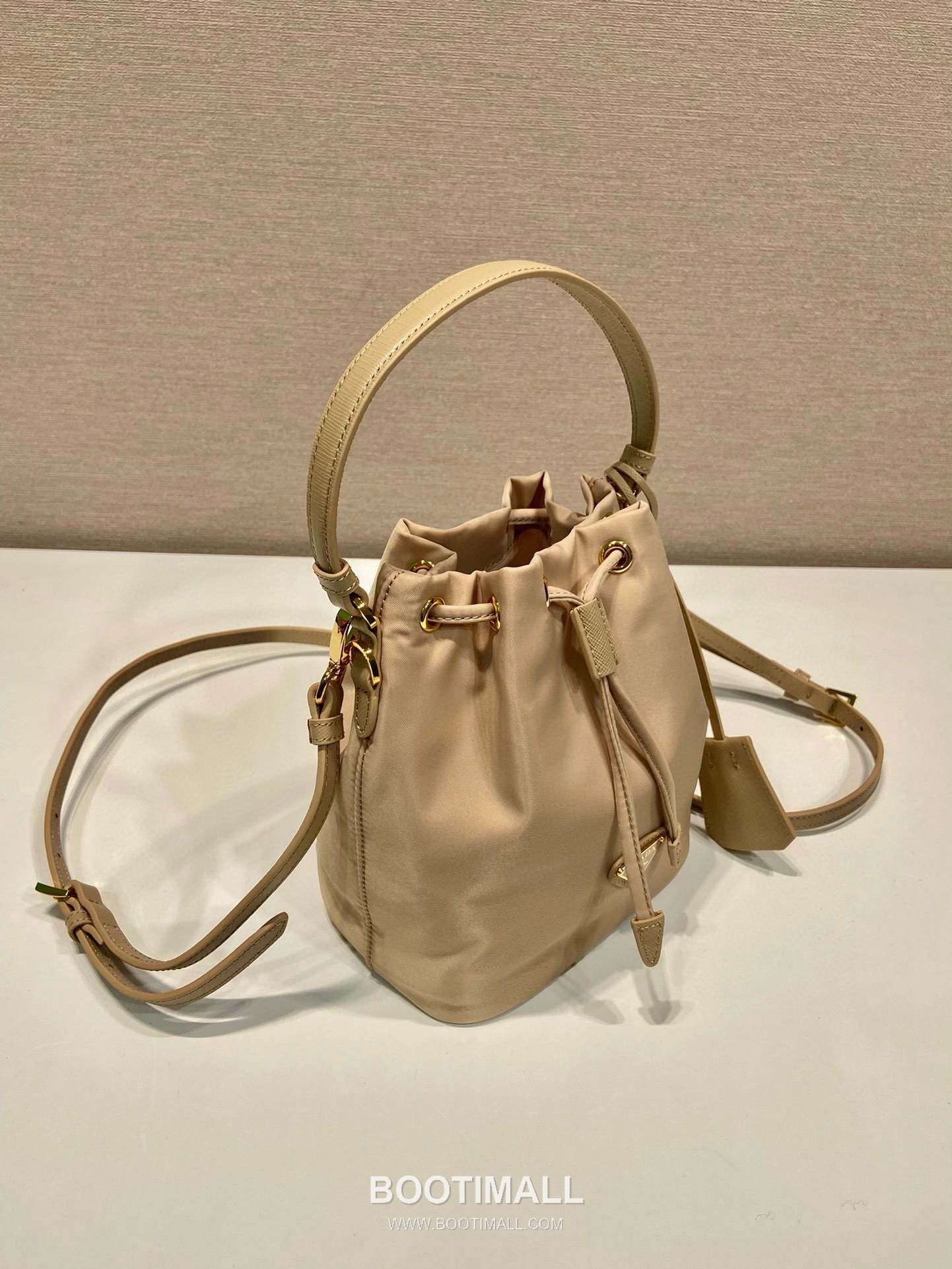Prada Nylon Bucket Bag with Calfskin Strap Triangle Logo Key Charm Detail 프라다 나일론 카프스킨 스트랩 트라이앵글 로고 키참 버킷백 1BE067 15.5cm 4