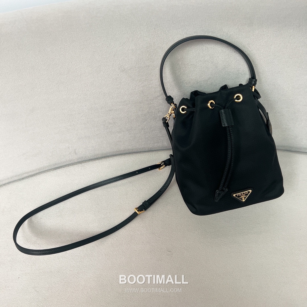 Prada Nylon Bucket Bag with Calfskin Strap Triangle Logo Key Charm Detail 프라다 나일론 카프스킨 스트랩 트라이앵글 로고 키참 버킷백 1BE067 15.5cm 7