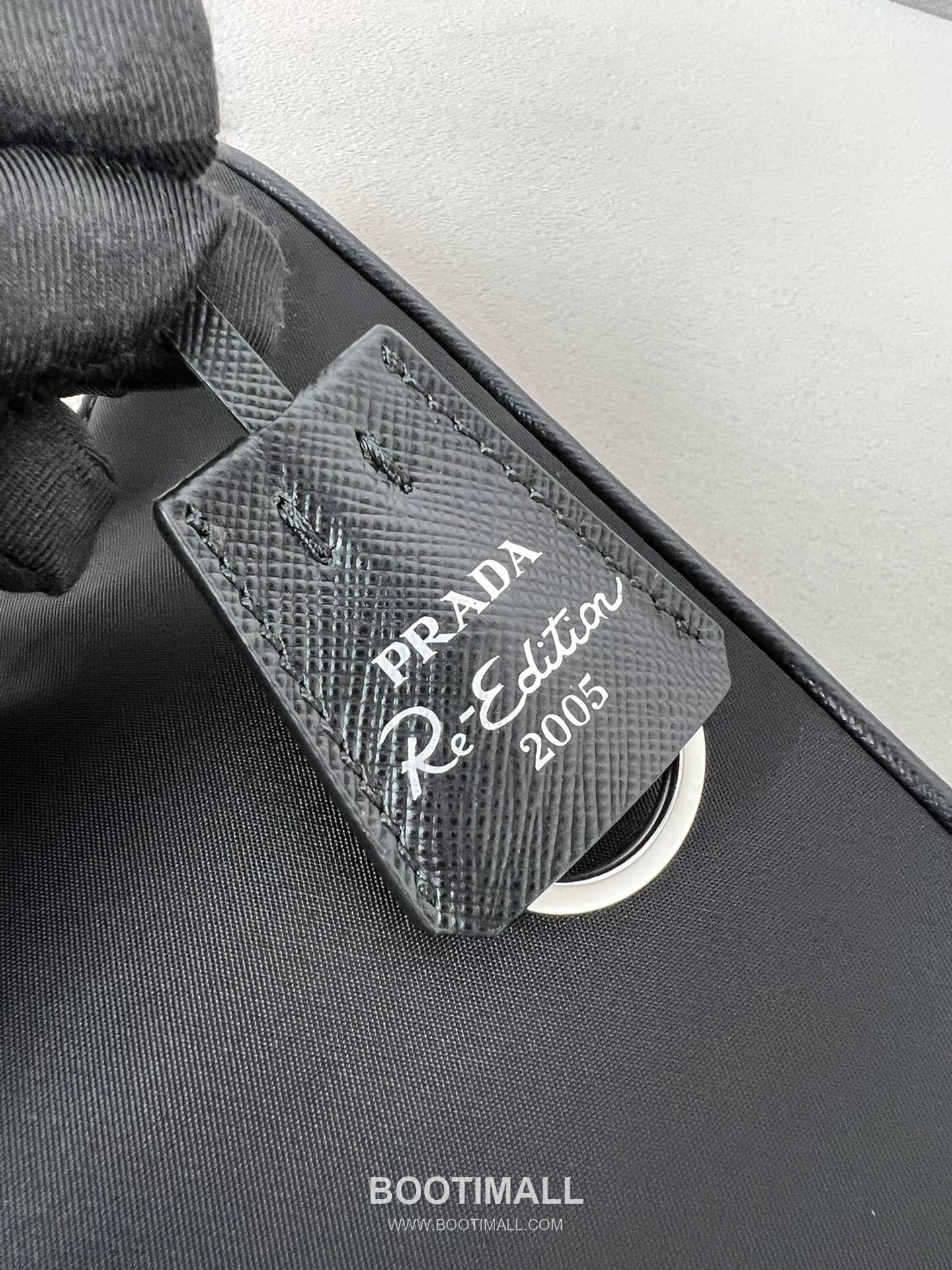 Prada Re-Edition 2005 Hobo Bag Calfskin Underarm Bag with Triangle Logo Zip Detail 프라다 리에디션 2005 카프스킨 언더암 트라이앵글 로고 집 호보백 1N204M 22cm 16