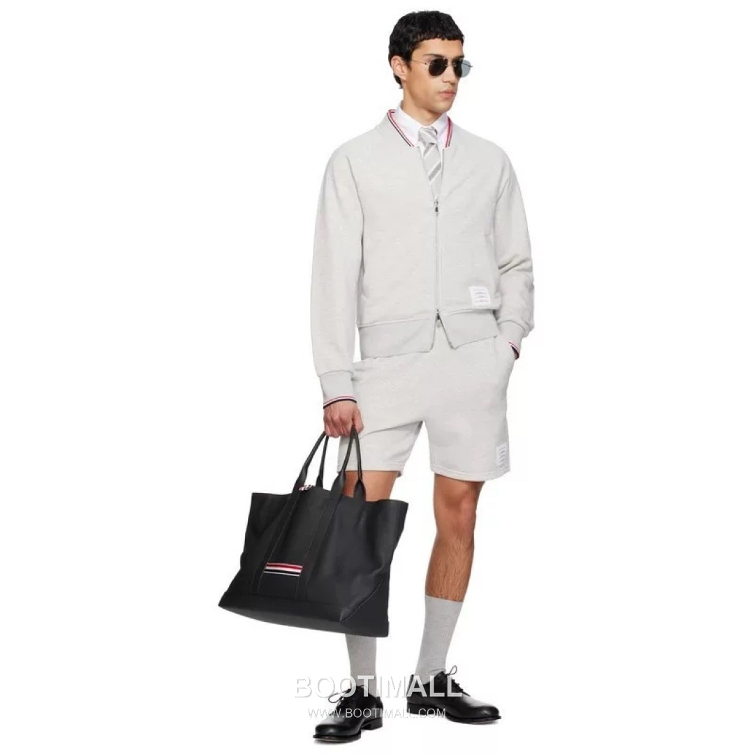 Thom Browne SS26 Cotton Zip-Up Varsity Jacket with Stripe Tape Detail 톰브라운 SS26 코튼 집업 바시티 재킷 스트라이프 테이프 디테일 WT262222 1