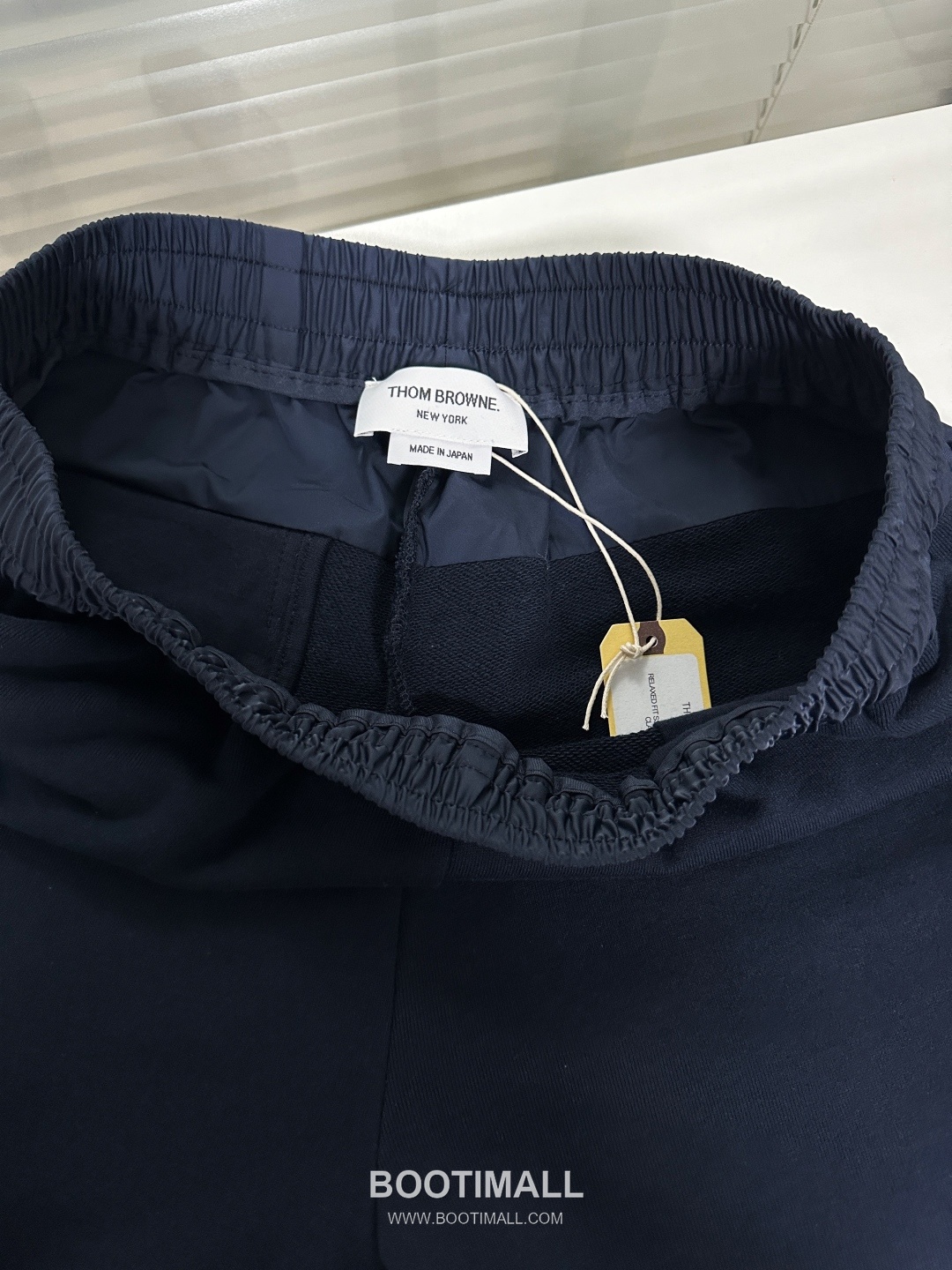 Thom Browne SS26 Cotton Patchwork Mid-Rise Sport Shorts with Logo Detail 톰브라운 SS26 코튼 패치워크 미드라이즈 스포츠 쇼츠 로고 디테일 11