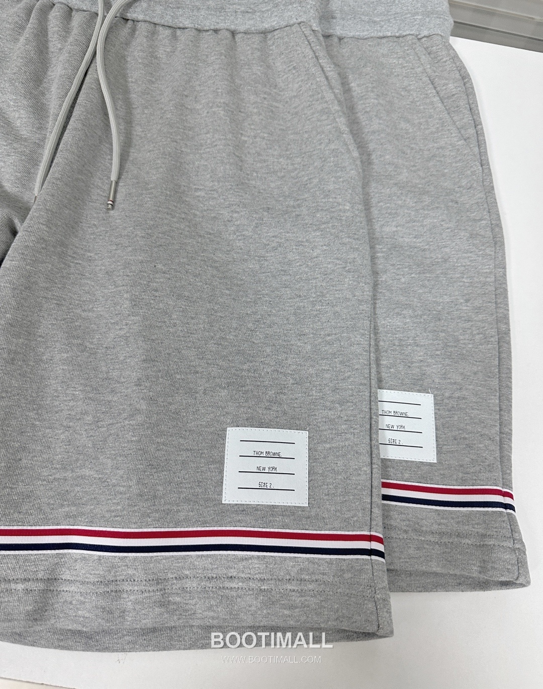 Thom Browne SS25 Cotton Terry Shorts with Tricolor Tape Trim Detail 톰브라운 SS25 코튼 테리 쇼츠 삼색 테이프 트림 디테일 6