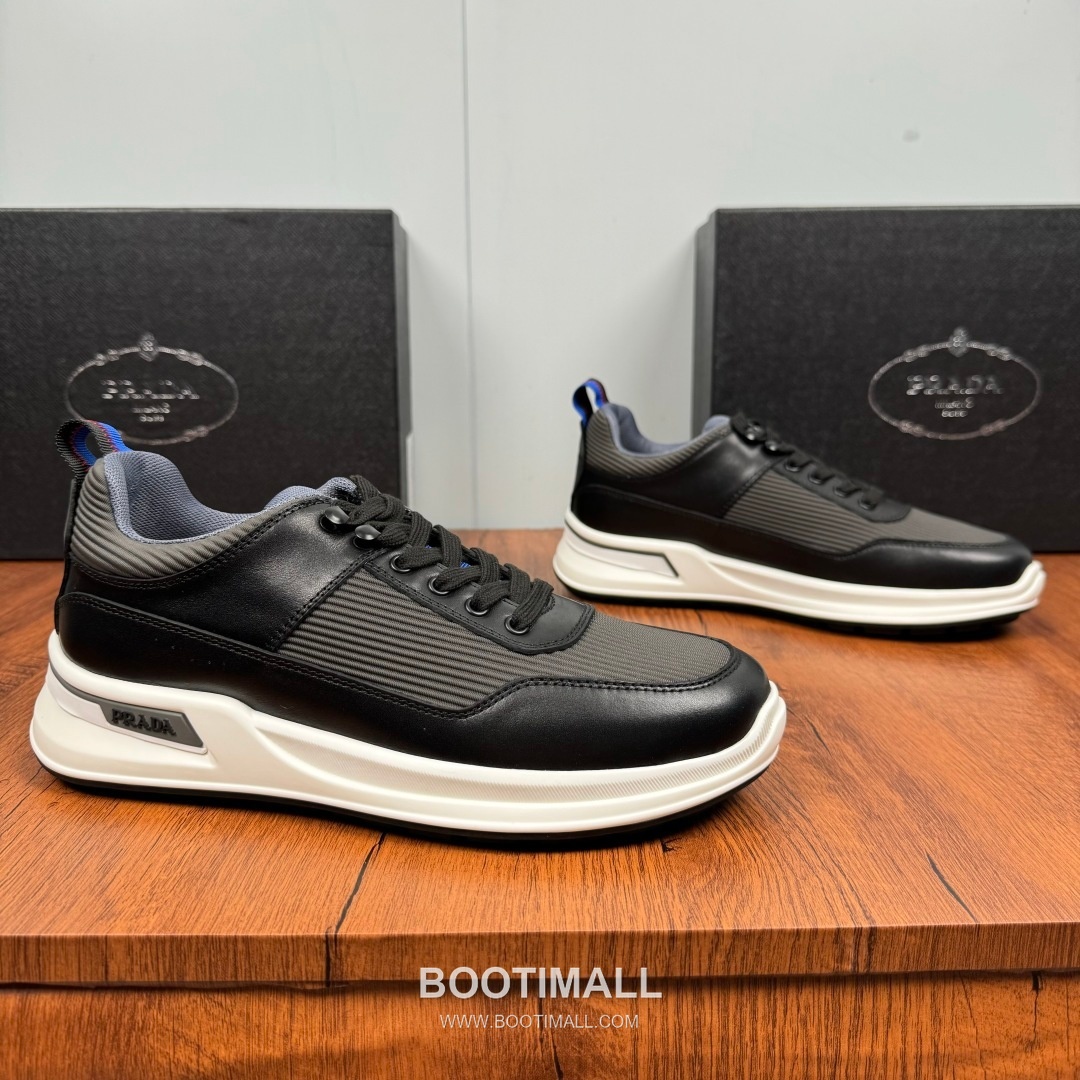 Prada Smooth Calfskin Nylon Low Sneakers with Metal Eyelet Logo Detail 프라다 스무스 카프스킨 나일론 로우 스니커즈 메탈 아일렛 로고 디테일 4.0cm 1