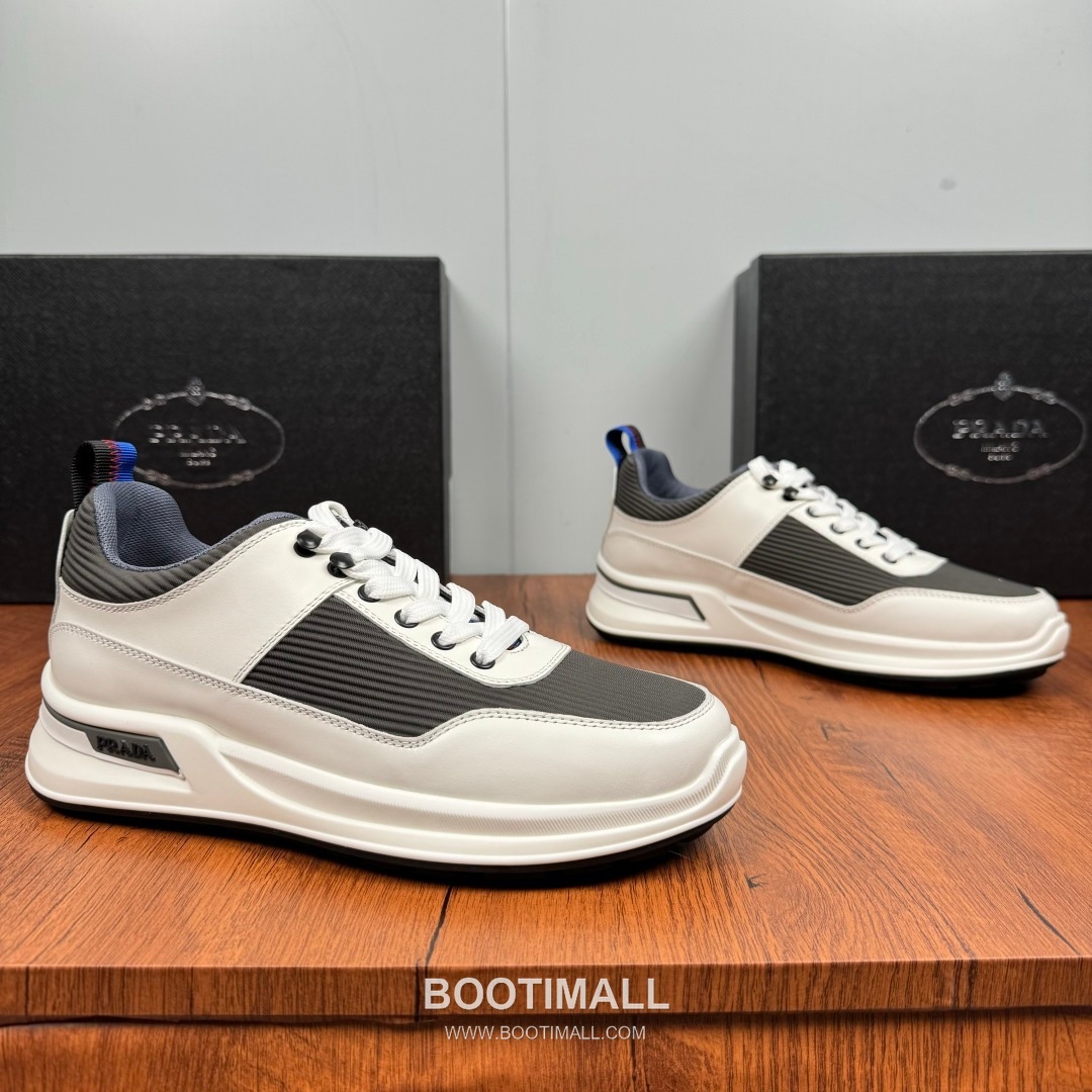 Prada Smooth Calfskin Nylon Low Sneakers with Metal Eyelet Logo Detail 프라다 스무스 카프스킨 나일론 로우 스니커즈 메탈 아일렛 로고 디테일 4.0cm 1