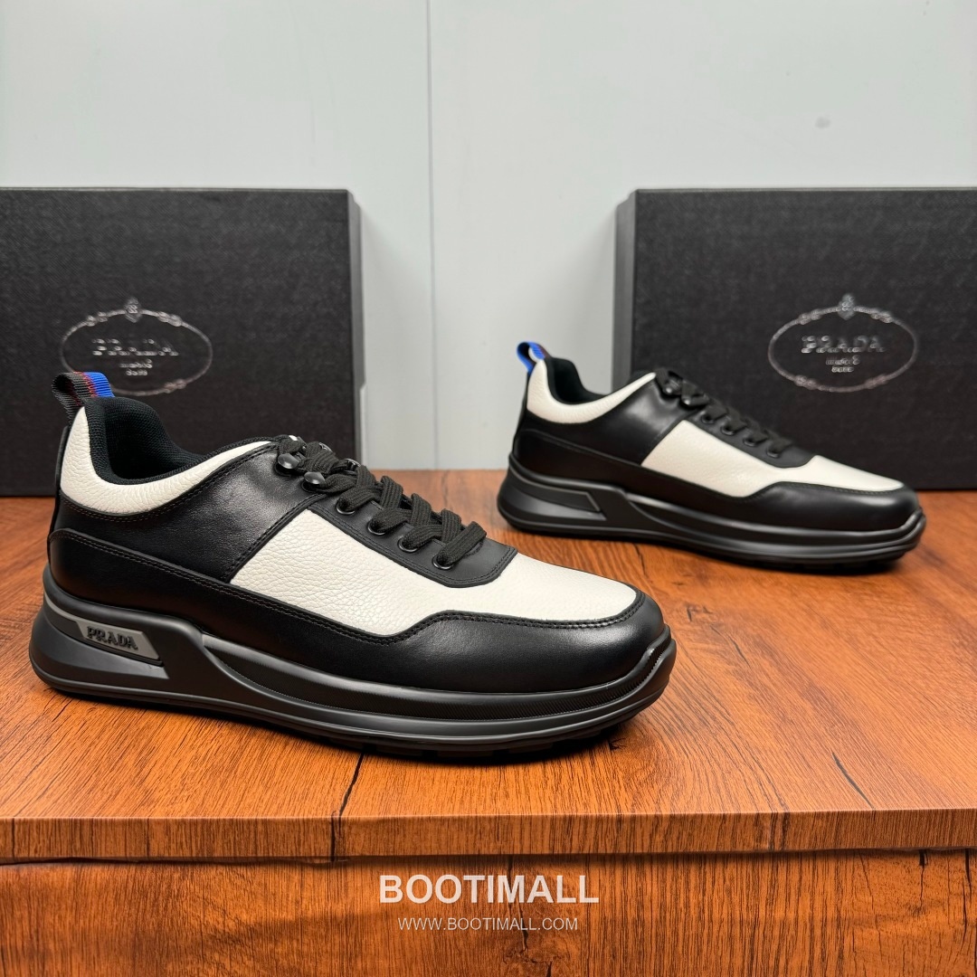 Prada Smooth Calfskin Nylon Low Sneakers with Metal Eyelet Logo Detail 프라다 스무스 카프스킨 나일론 로우 스니커즈 메탈 아일렛 로고 디테일 4.0cm 1