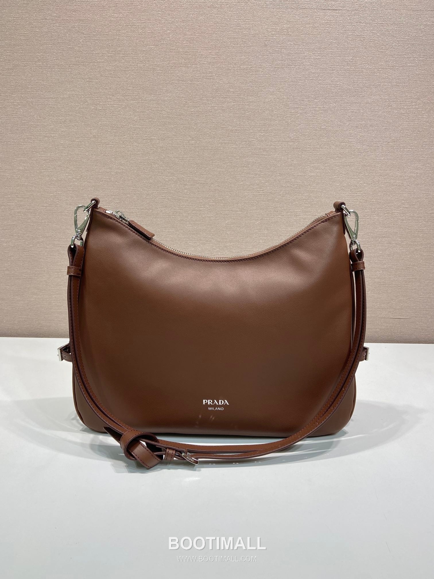 Prada Calfskin Hobo Shoulder Bag with Embossed Logo and Zip Closure 프라다 카프스킨 엠보스드 로고 지퍼 호보 숄더백 1BC288 33cm 1