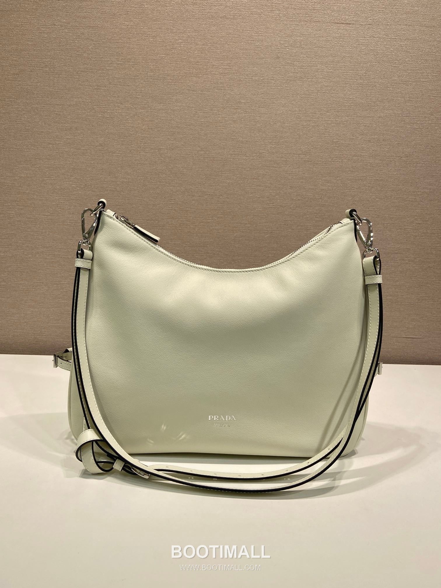 Prada Calfskin Hobo Shoulder Bag with Embossed Logo and Zip Closure 프라다 카프스킨 엠보스드 로고 지퍼 호보 숄더백 1BC288 33cm 1