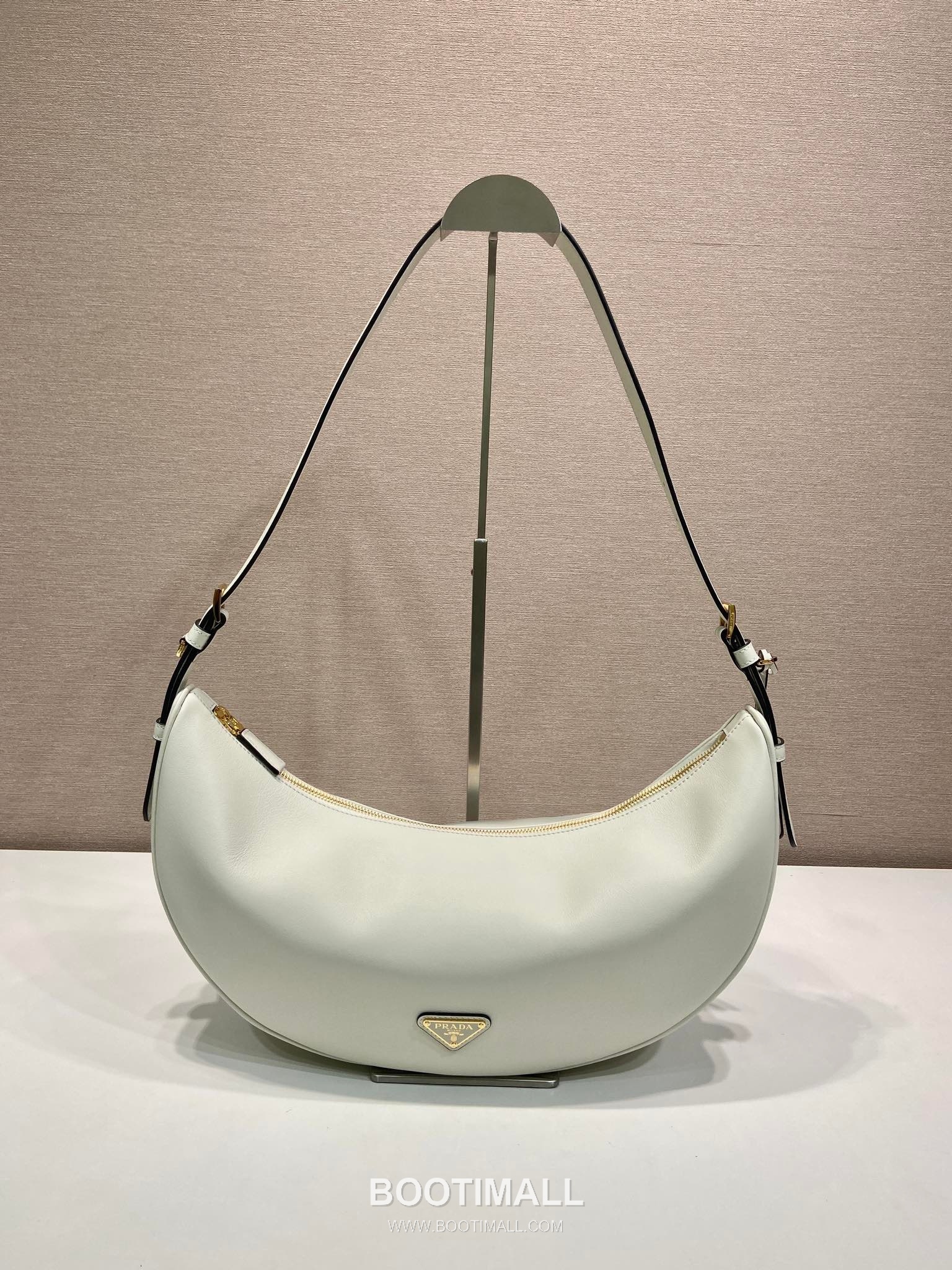 Prada Calfskin Leather Crescent Hobo Bag with Adjustable Strap and Curved Design 프라다 카프스킨 가죽 크레센트 스트랩 호보백 1BC255 42cm 1