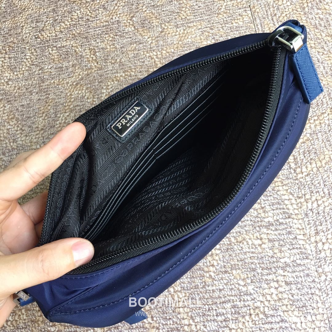 Prada Nylon Saffiano Leather Clutch Bag with Wrist Strap and Zip Pocket 프라다 나일론 사피아노 레더 스트랩 지퍼 클러치백 2NH007 28cm 9