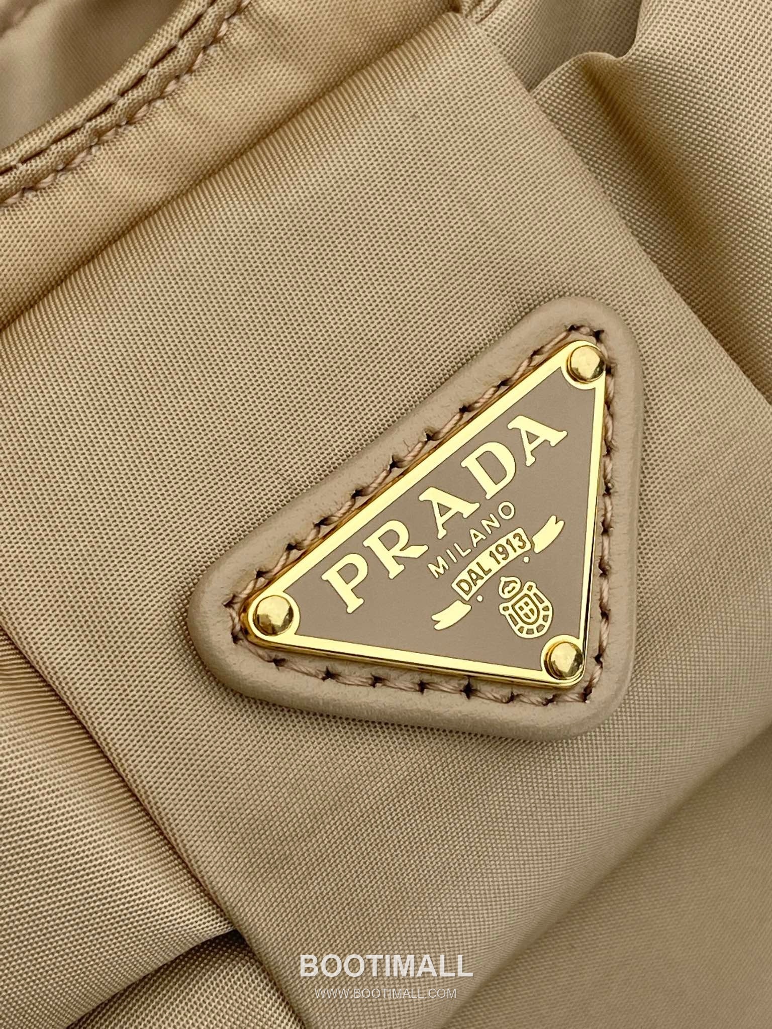 Prada Padded Nylon and Lambskin Bucket Bag with Oversize Bow Detail 프라다 패디드 나일론 램스킨 오버사이즈 보우 버킷백 1BA359 18cm 6