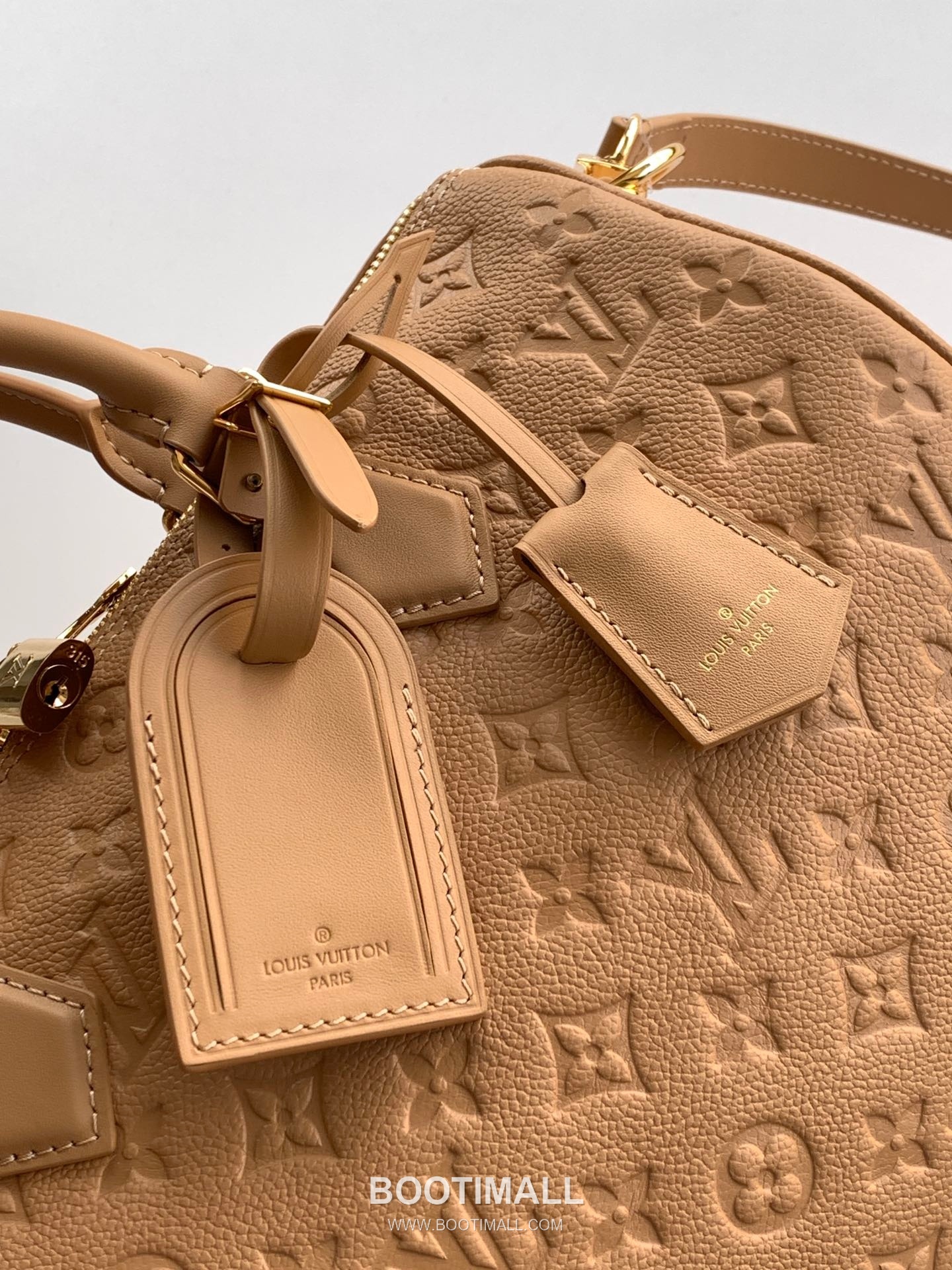 Louis Vuitton Speedy Soft 30 Monogram Empreinte Leather Top Handle Shoulder Bag with Lock Detail 루이비통 스피디 소프트 30 모노그램 앙프렝뜨 레더 락장식 숄더 토트백 M11323 30cm 6