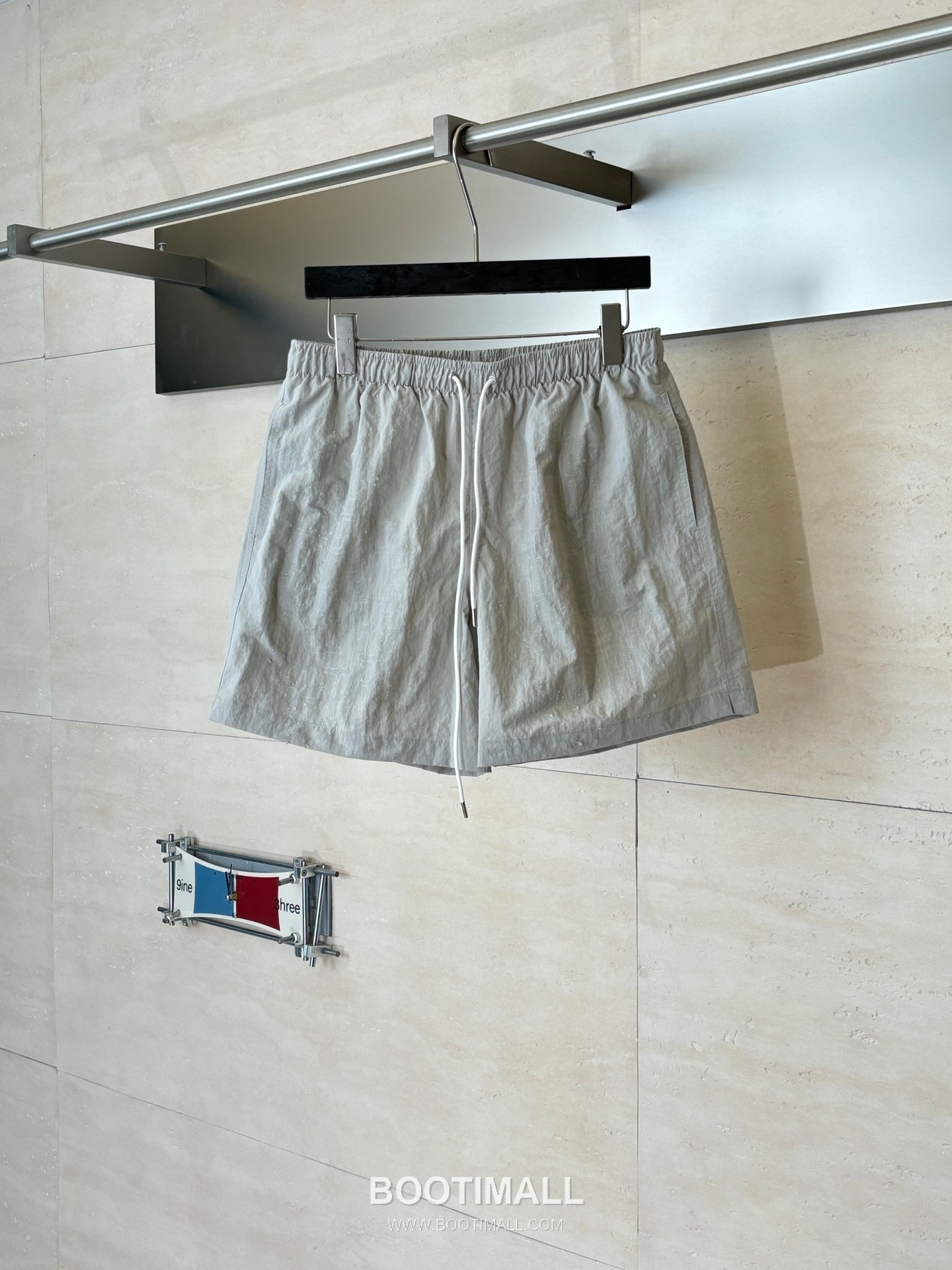 에르메스 2026SS H 미로 모노그램 워터리액티브 루즈핏 비치 쇼츠 카키 팬츠 Hermes 2026 SS H Maze Monogram Water Reactive Loose Fit Beach Shorts Orange Pants 3