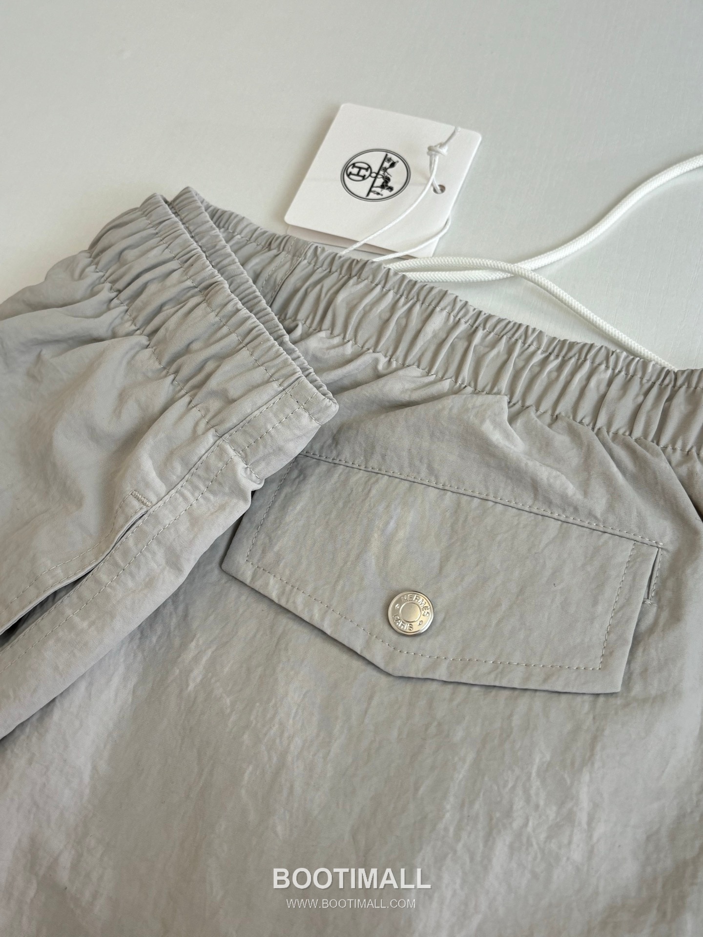 에르메스 2026SS H 미로 모노그램 워터리액티브 루즈핏 비치 쇼츠 카키 팬츠 Hermes 2026 SS H Maze Monogram Water Reactive Loose Fit Beach Shorts Orange Pants 9