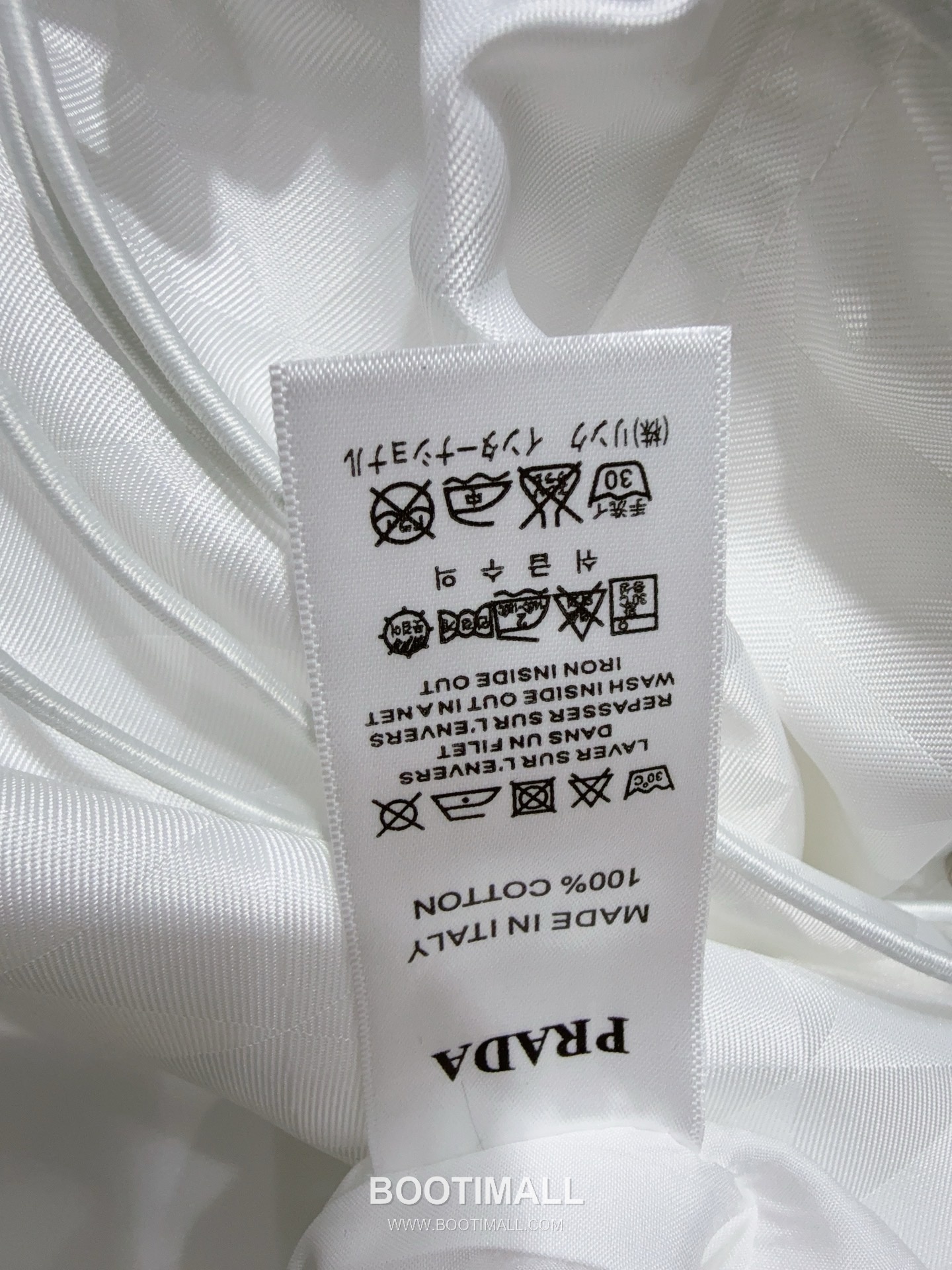 프라다 2026SS 리나일론 삼각자카드 로고 하프집업 폴로카라 A라인 반팔 원피스 Prada 2026 SS Re Nylon Triangle Jacquard Logo Half Zip Polo Collar A Line Short Sleeve Dress 15